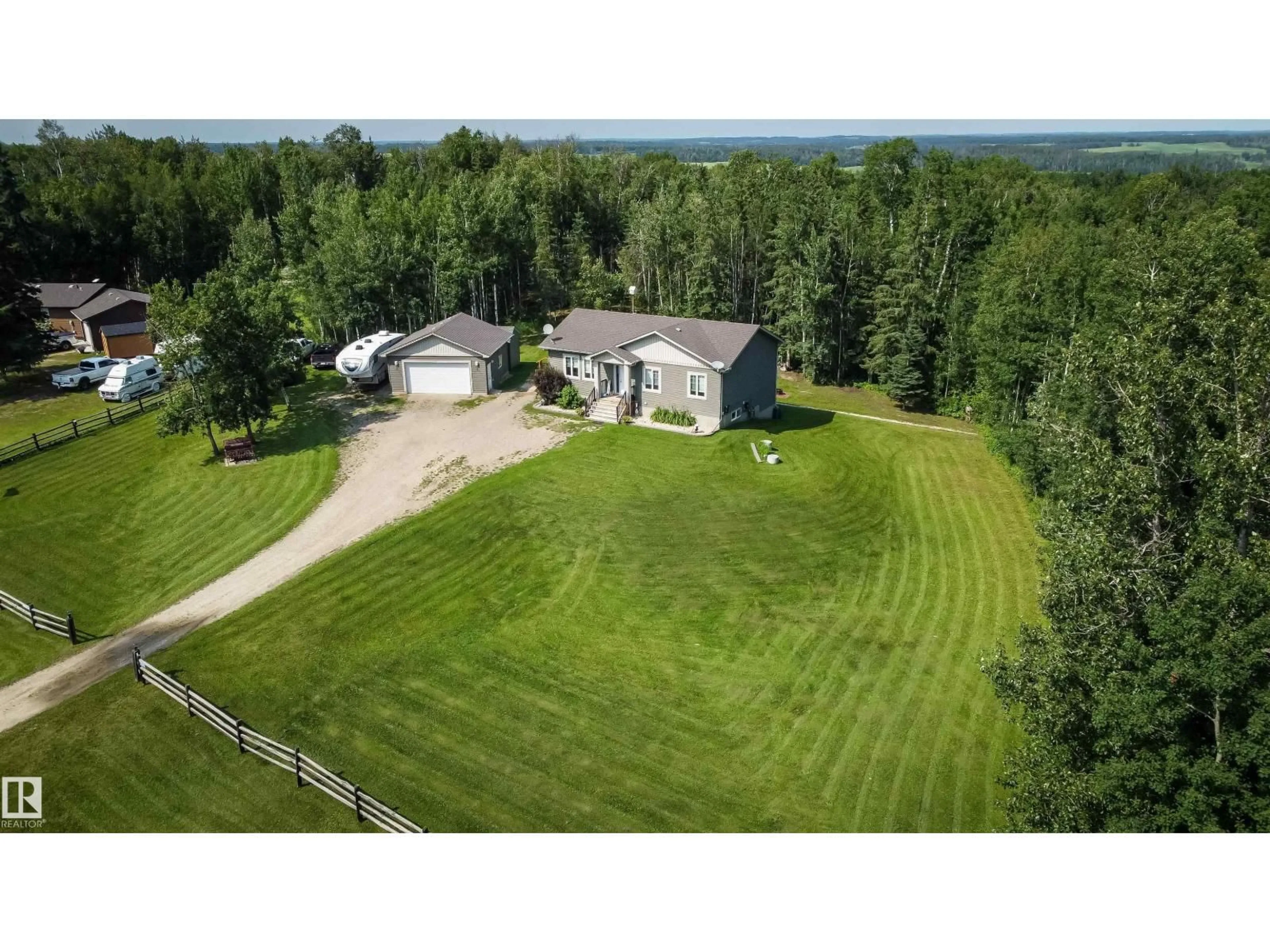 A pic from outside/outdoor area/front of a property/back of a property/a pic from drone, unknown for 200 55108 RGE ROAD 15, Rural Lac Ste. Anne County Alberta T0E1V0