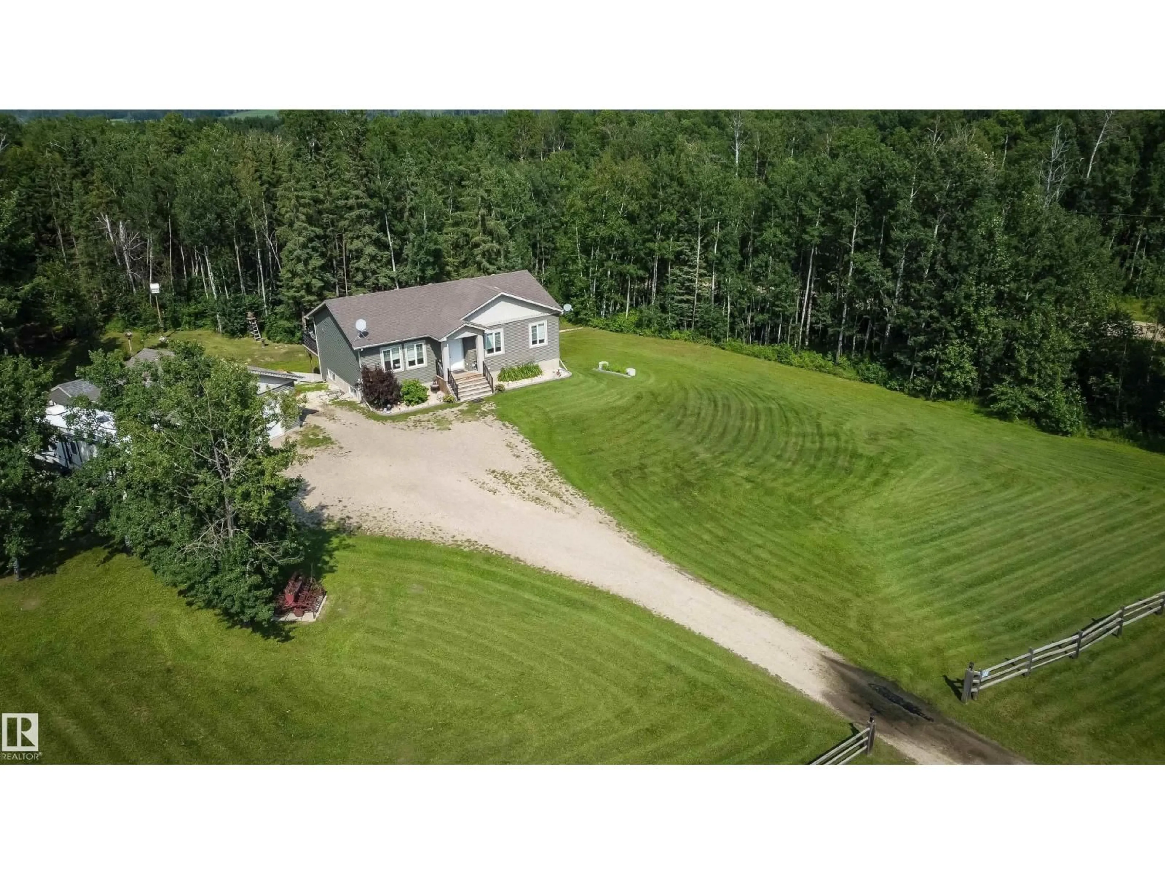 A pic from outside/outdoor area/front of a property/back of a property/a pic from drone, unknown for 200 55108 RGE ROAD 15, Rural Lac Ste. Anne County Alberta T0E1V0