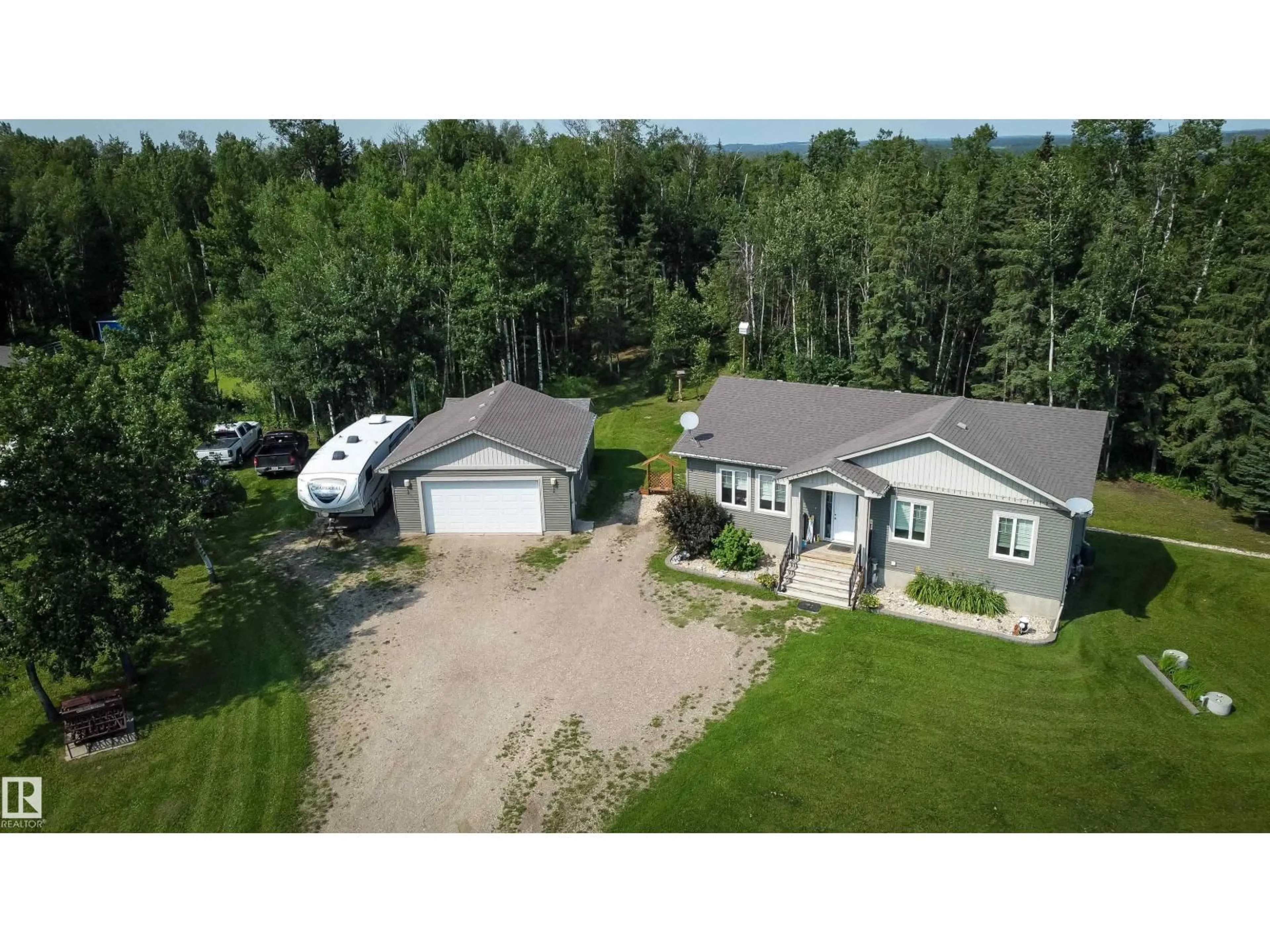 A pic from outside/outdoor area/front of a property/back of a property/a pic from drone, street for 200 55108 RGE ROAD 15, Rural Lac Ste. Anne County Alberta T0E1V0