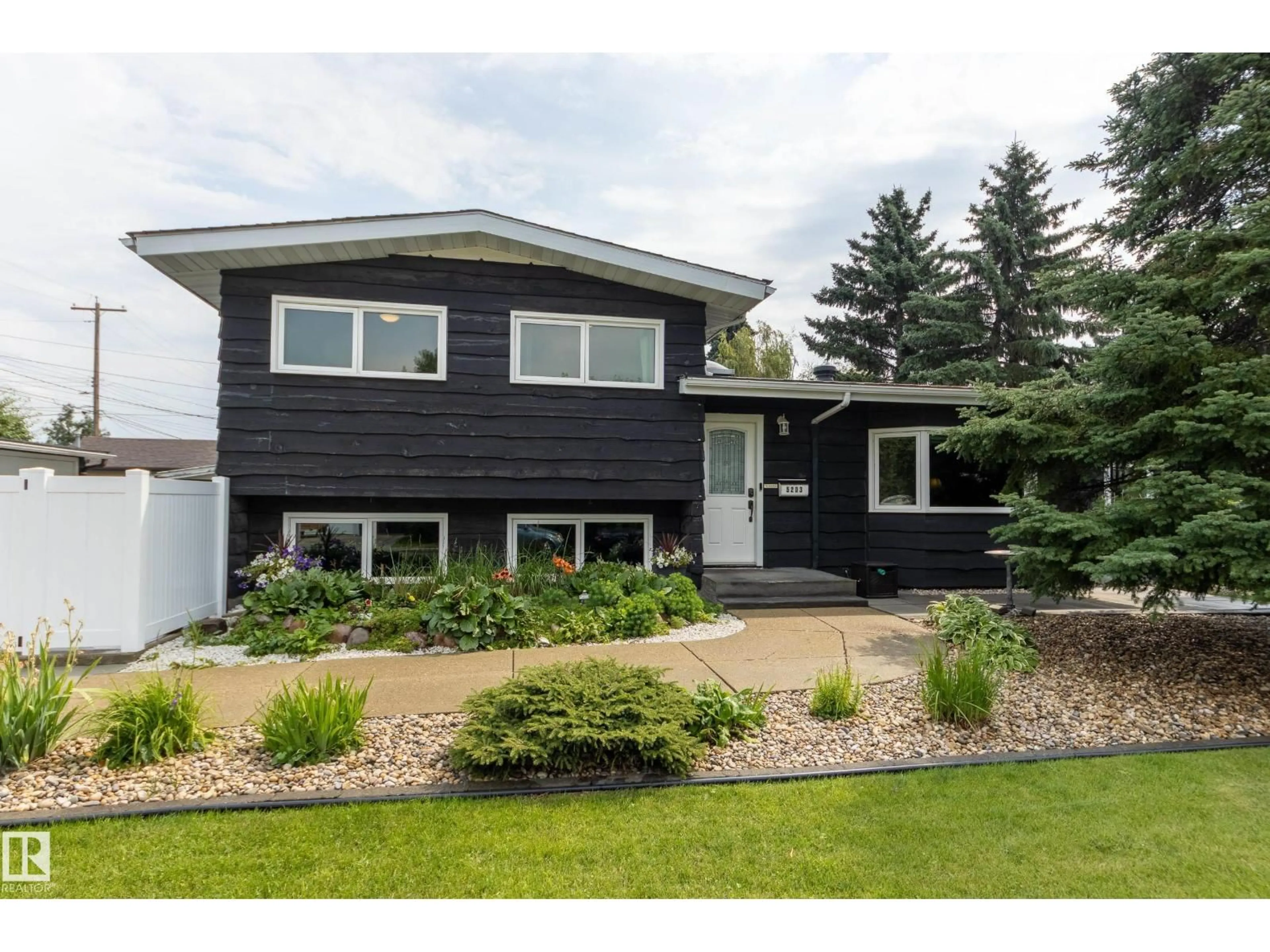 Home with vinyl exterior material, street for 5203 105 ST, Edmonton Alberta T6H2N7
