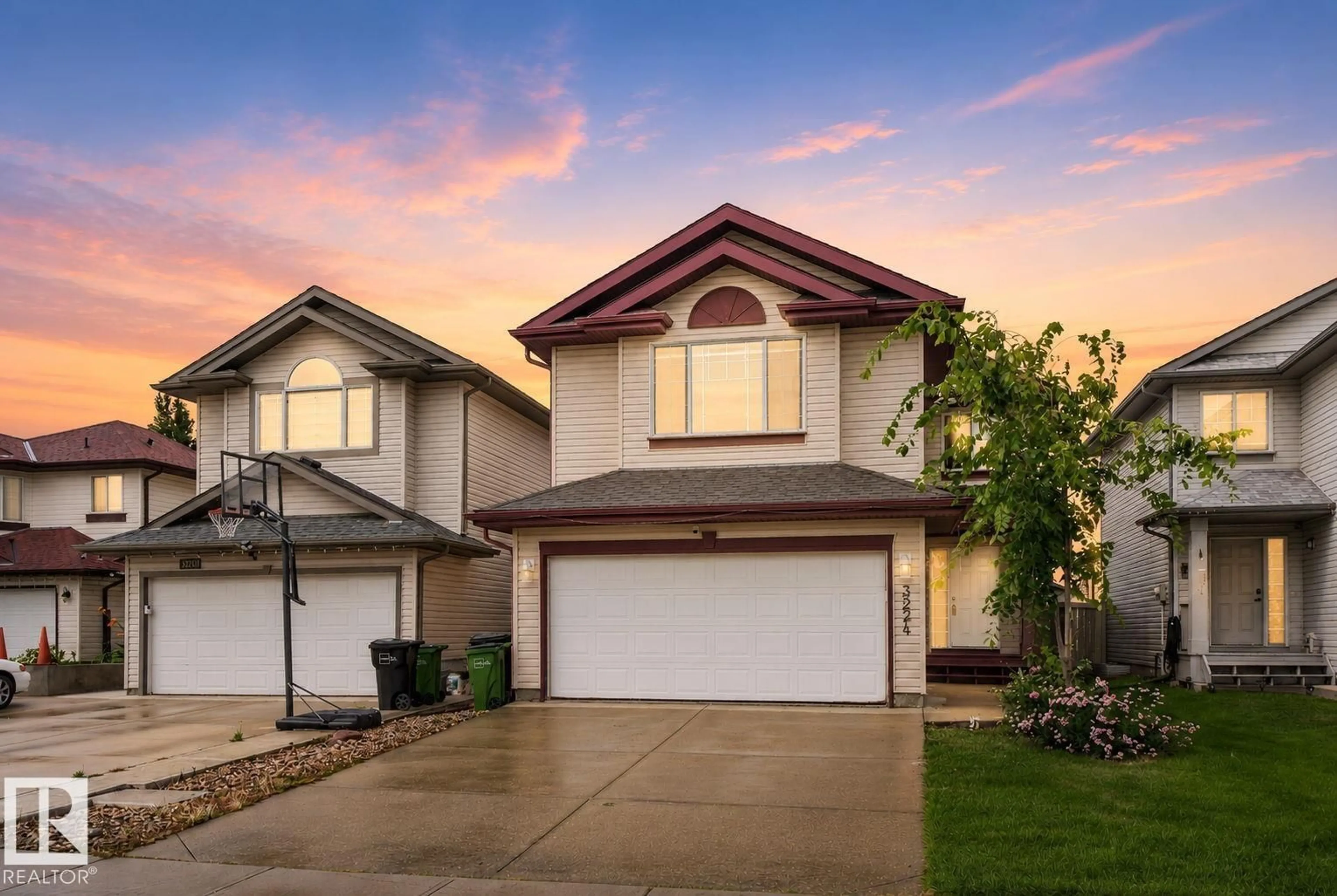 Home with vinyl exterior material, street for 3224 26 ST, Edmonton Alberta T6T1Z3