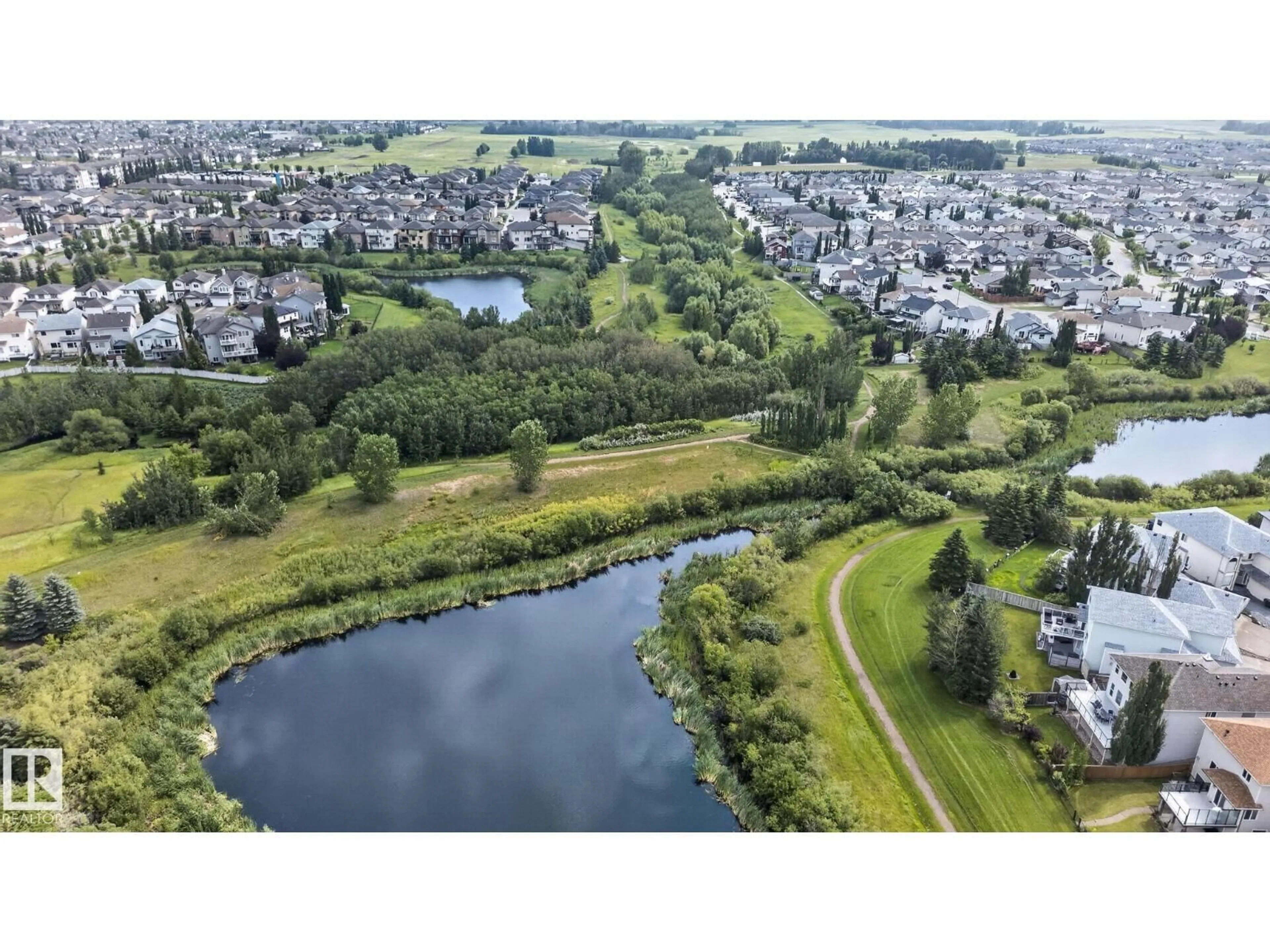 A pic from outside/outdoor area/front of a property/back of a property/a pic from drone, water/lake/river/ocean view for 3224 26 ST, Edmonton Alberta T6T1Z3