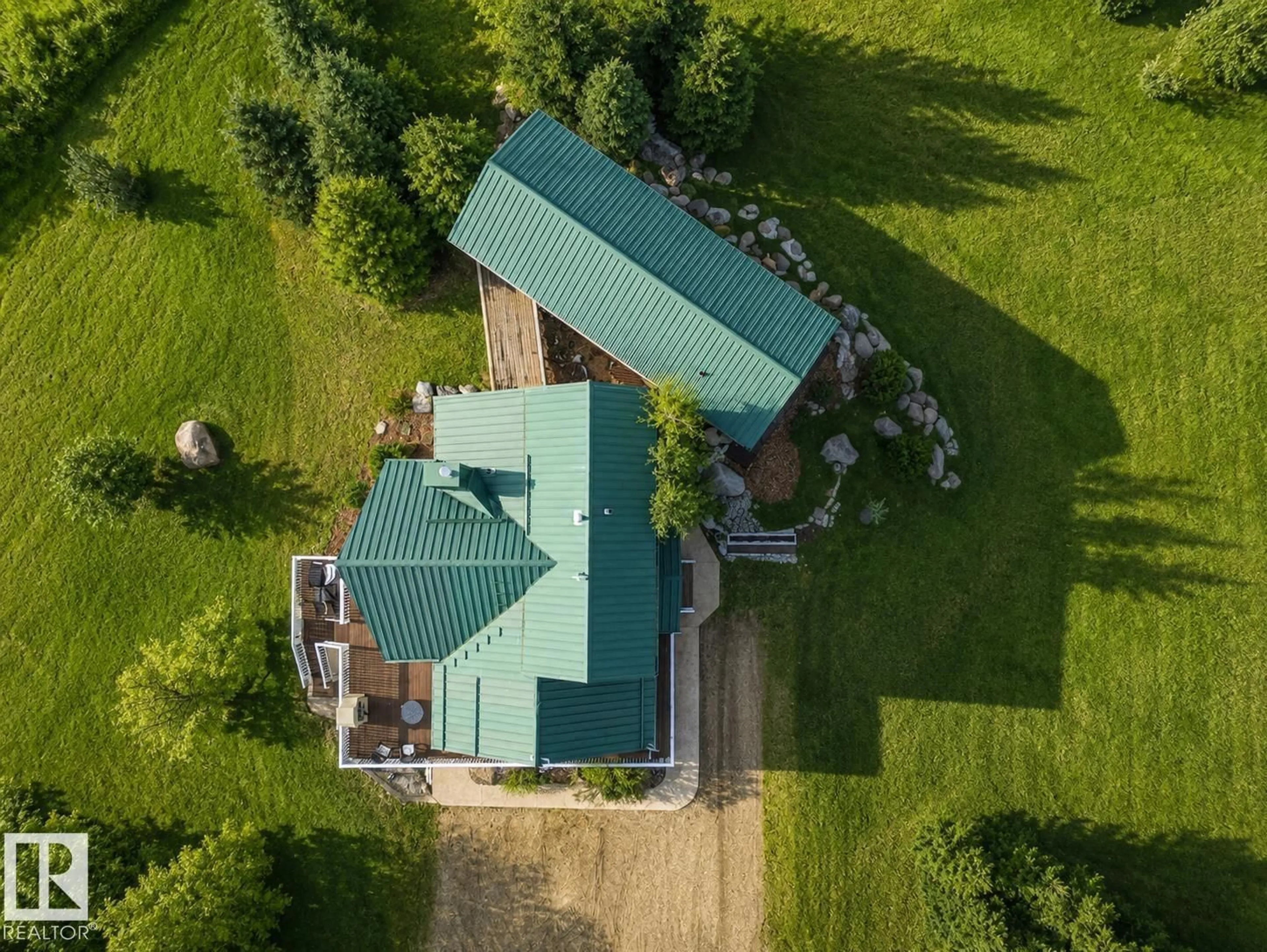 A pic from outside/outdoor area/front of a property/back of a property/a pic from drone, building for 120 50434 RGE RD 232, Rural Leduc County Alberta T4X0L1