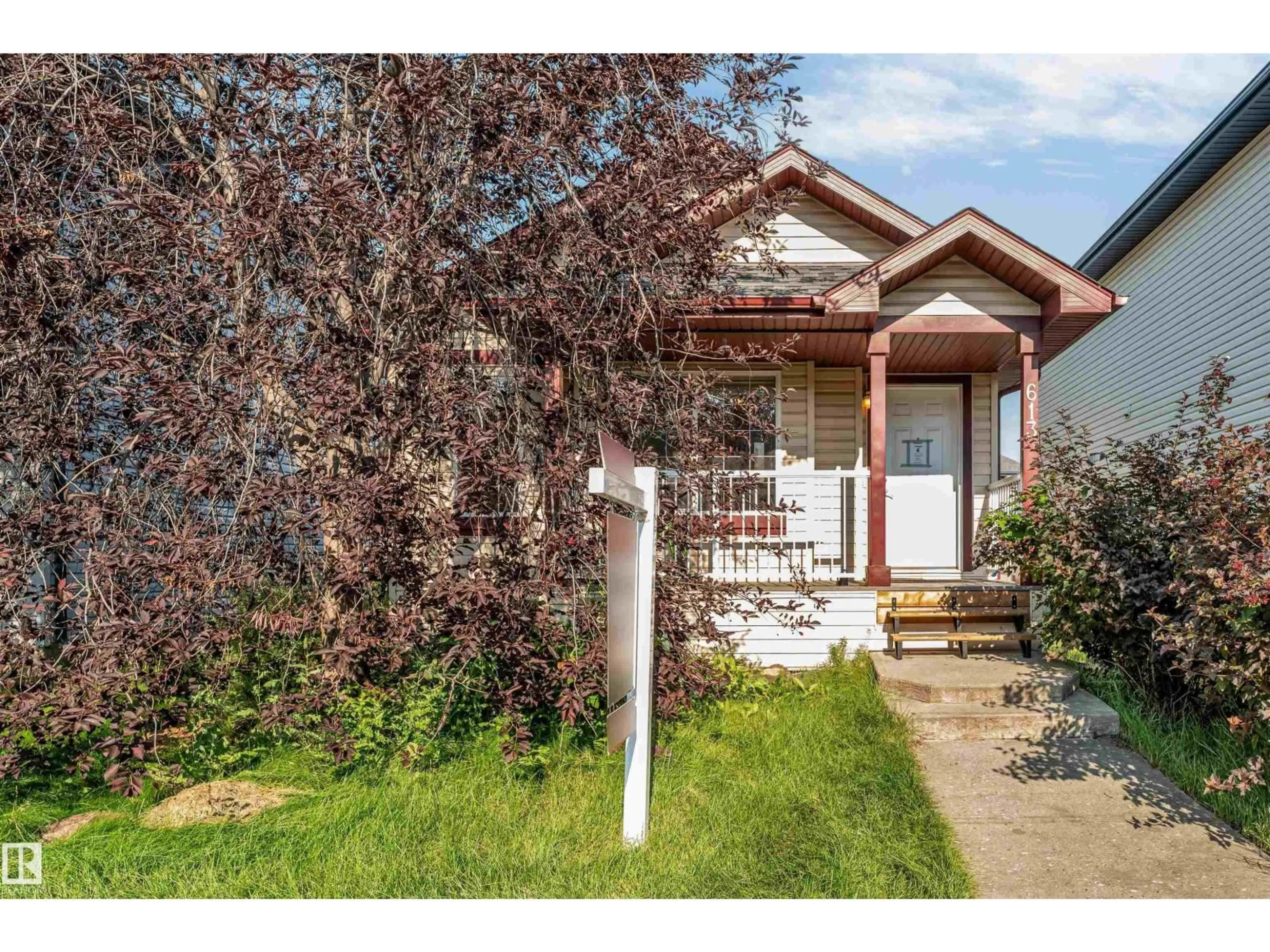 Home with vinyl exterior material, street for 613 83 ST, Edmonton Alberta T6X1L6