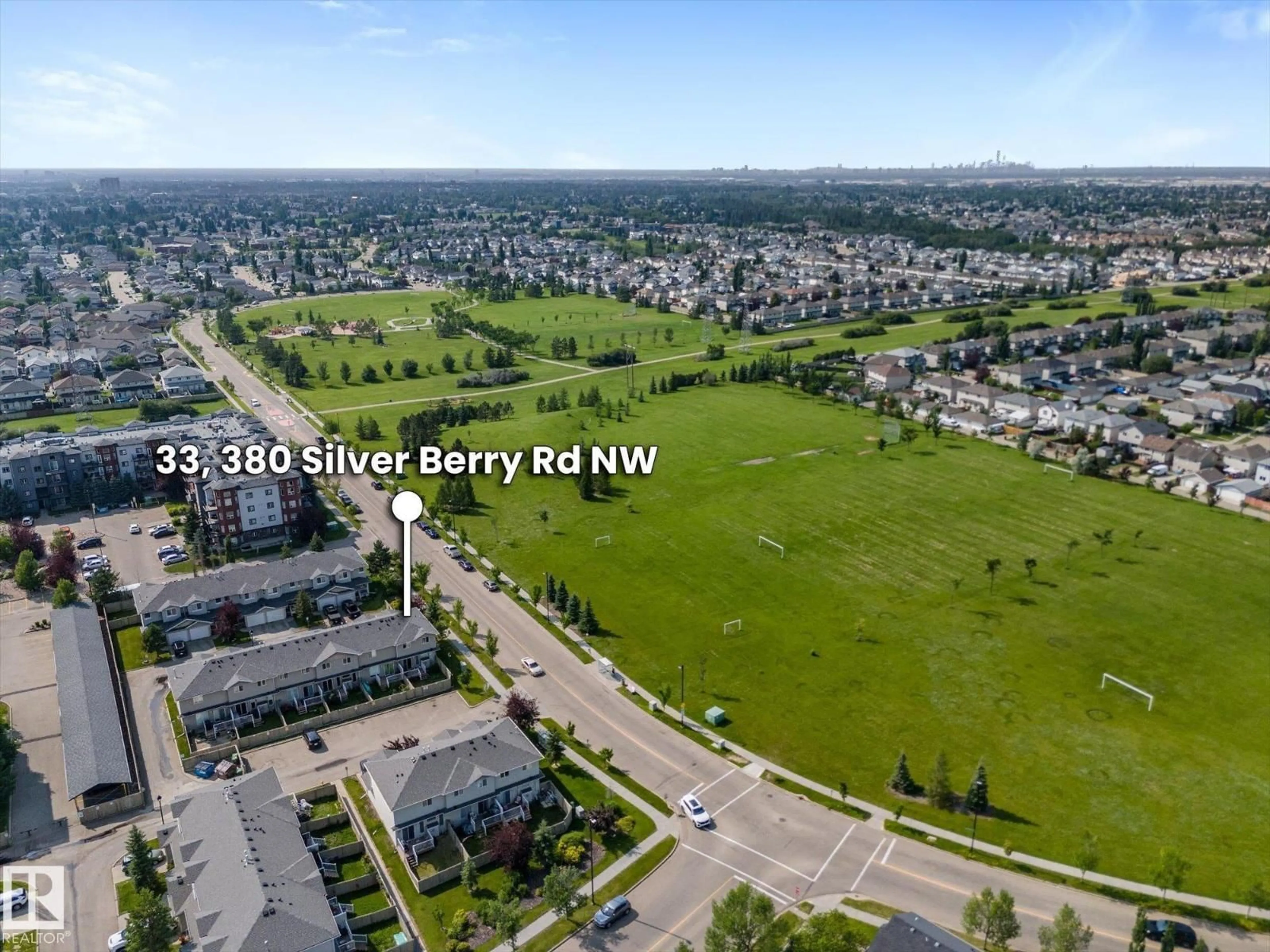 A pic from outside/outdoor area/front of a property/back of a property/a pic from drone, water/lake/river/ocean view for 380 - 33 SILVER BERRY RD, Edmonton Alberta T6T0G4