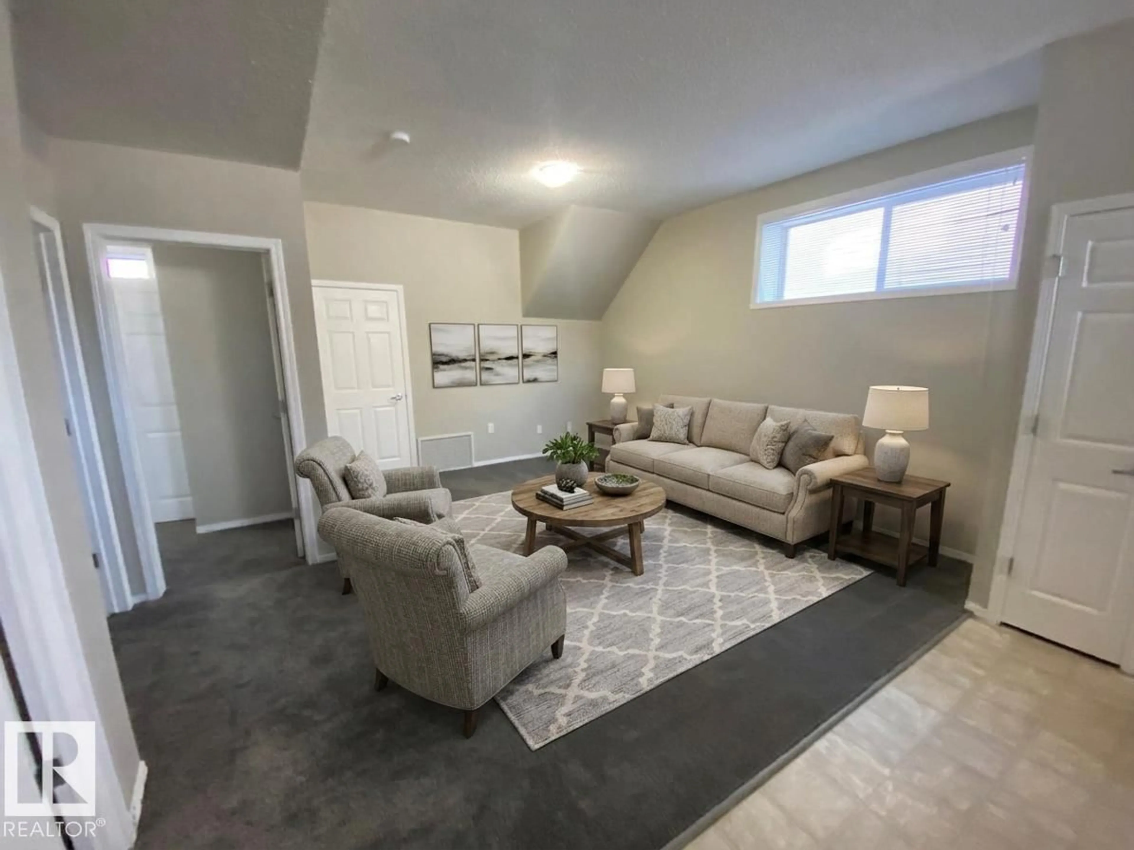 Living room with furniture, unknown for 142 - 122 SELKIRK PL, Leduc Alberta T9E0M9