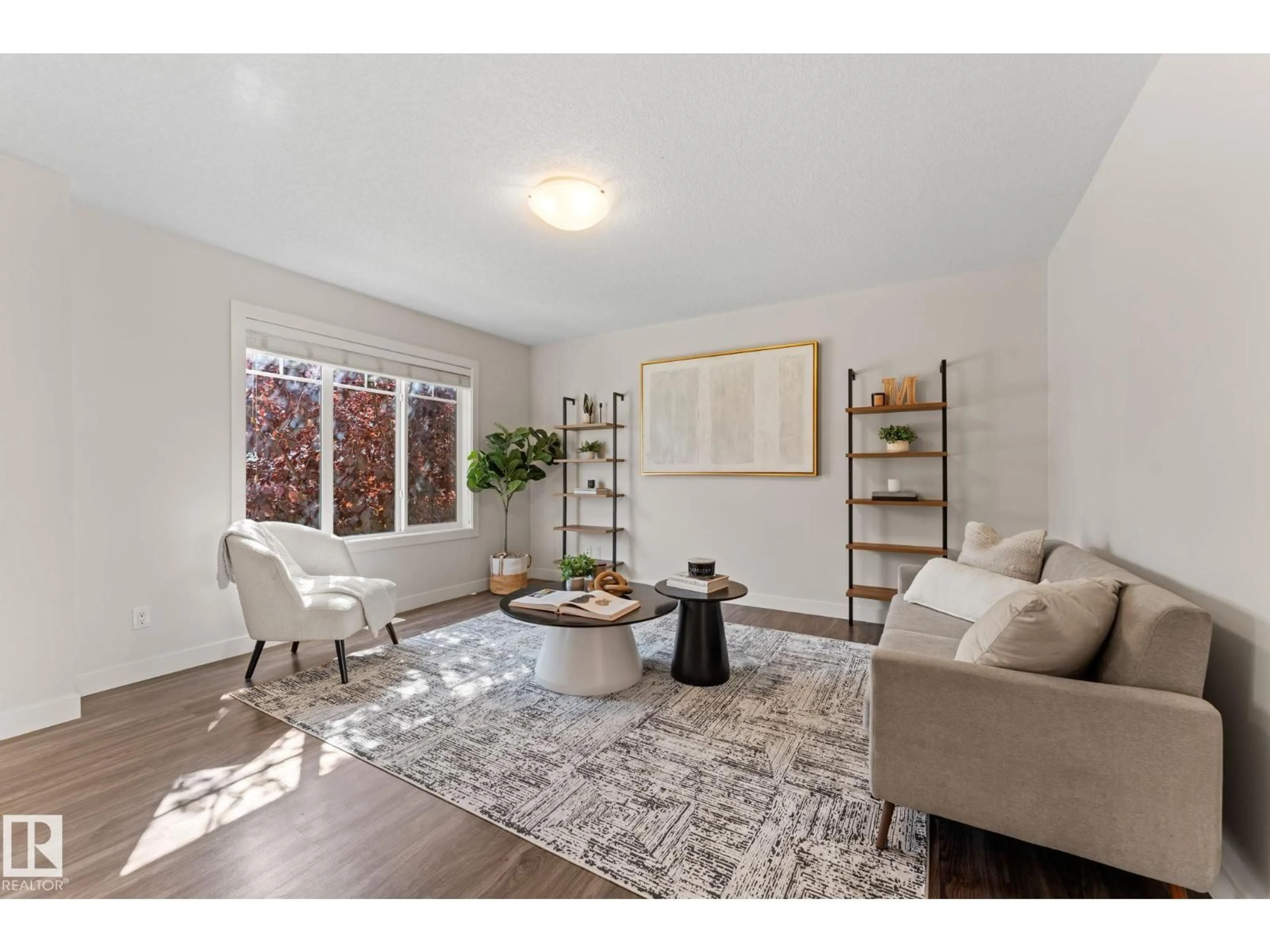 Living room with furniture, unknown for 7289 - 18 SOUTH TERWILLEGAR DR, Edmonton Alberta T6R0N5
