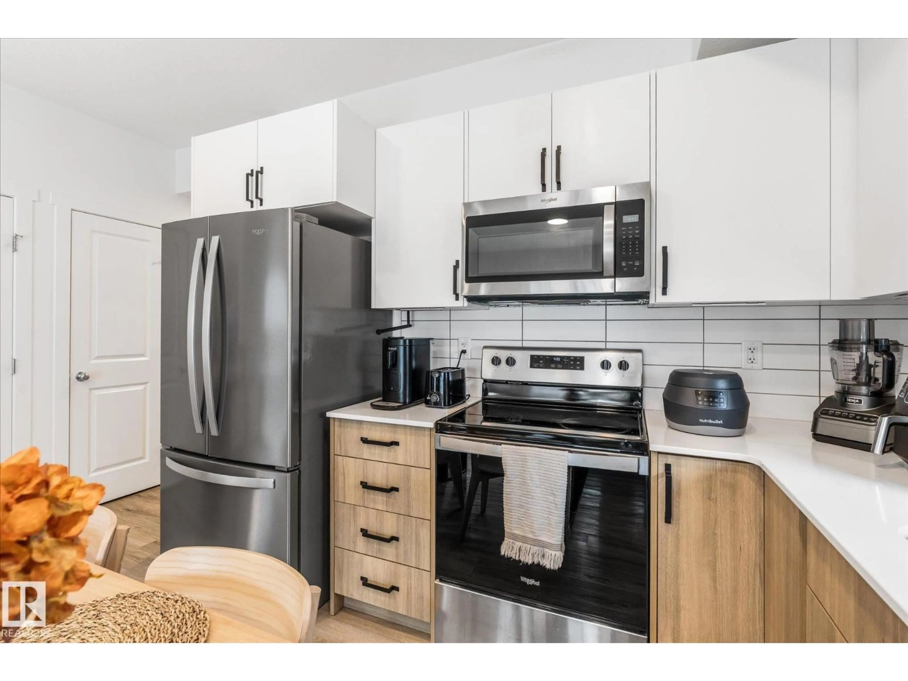 Standard kitchen, wood/laminate floor for #104 - 860 SECORD BV, Edmonton Alberta T5T7R9