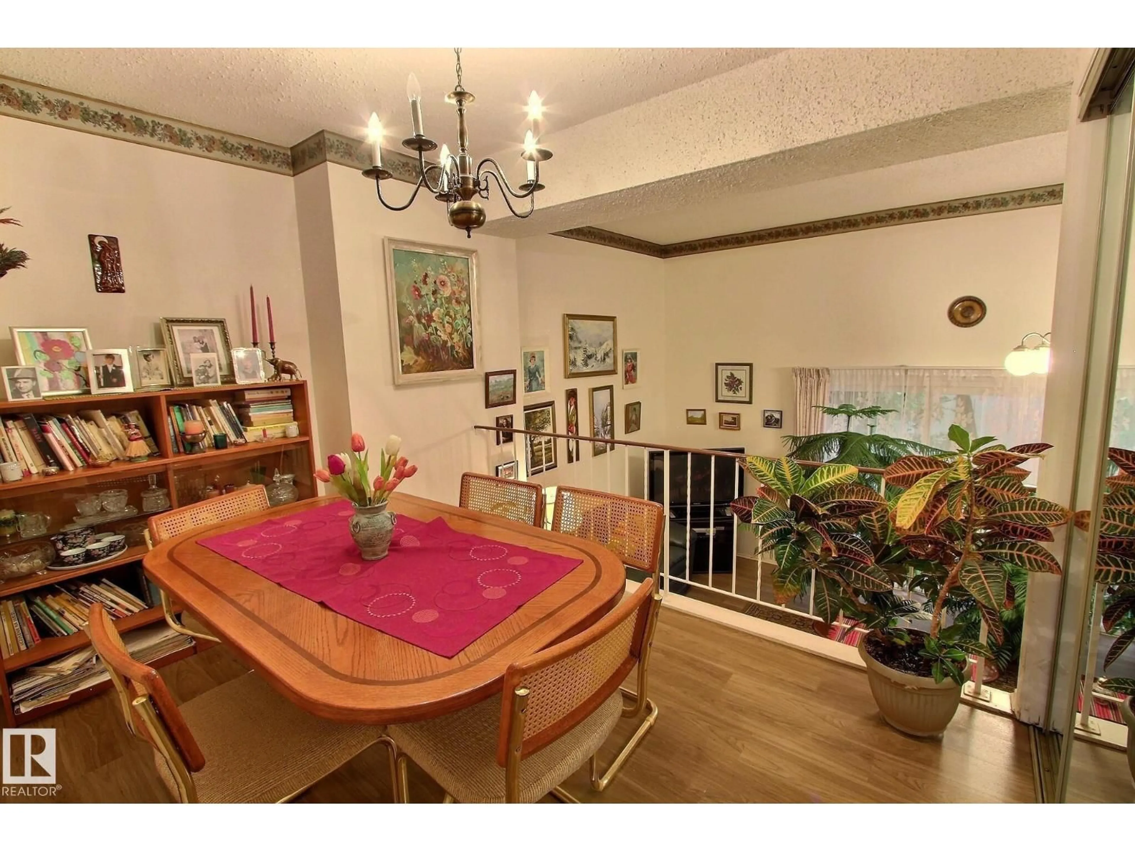 Dining room, wood/laminate floor for 14626 52 ST, Edmonton Alberta T5A3M7