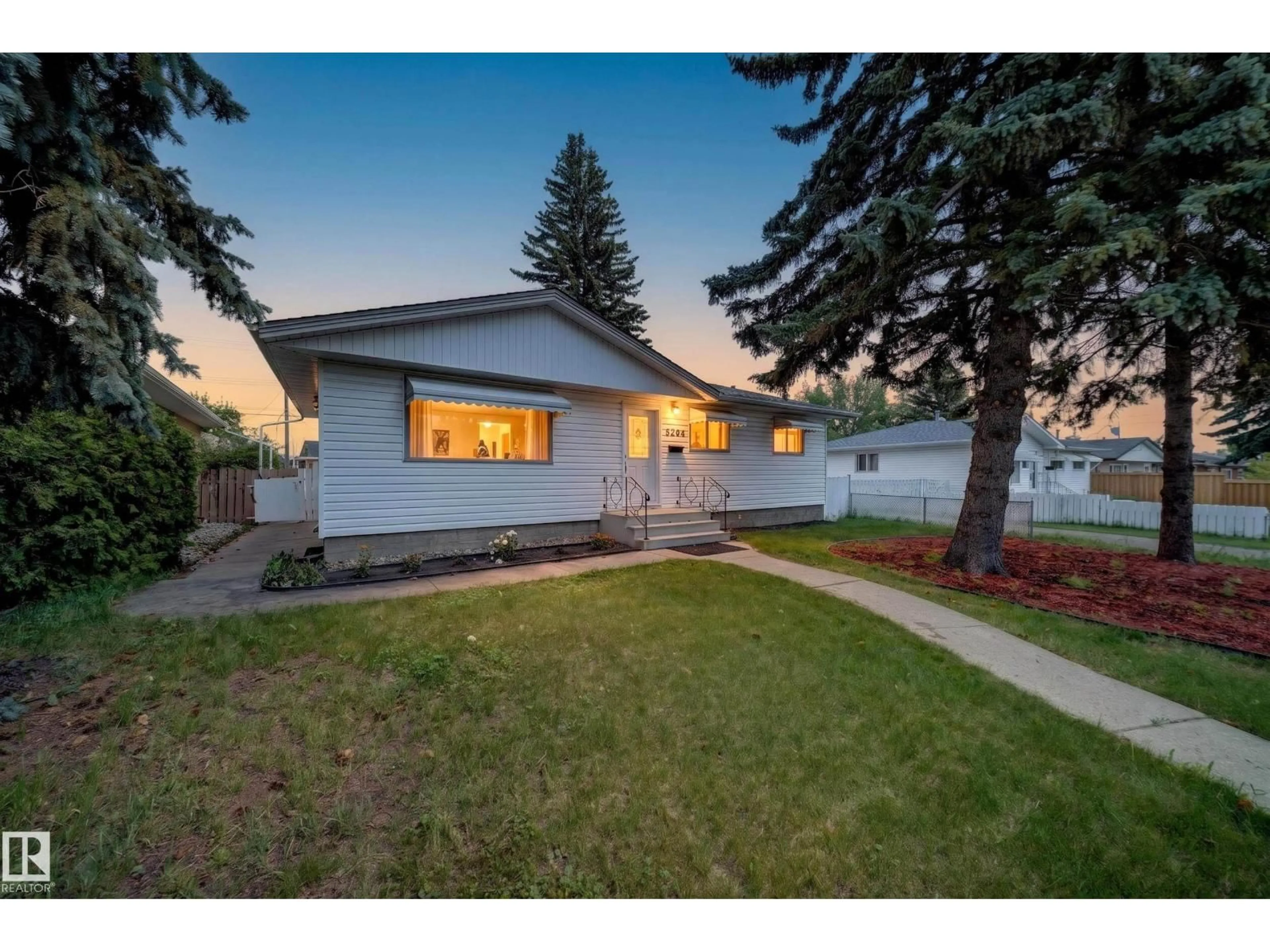 Home with vinyl exterior material, street for 5204 97A AV, Edmonton Alberta T6B1E1
