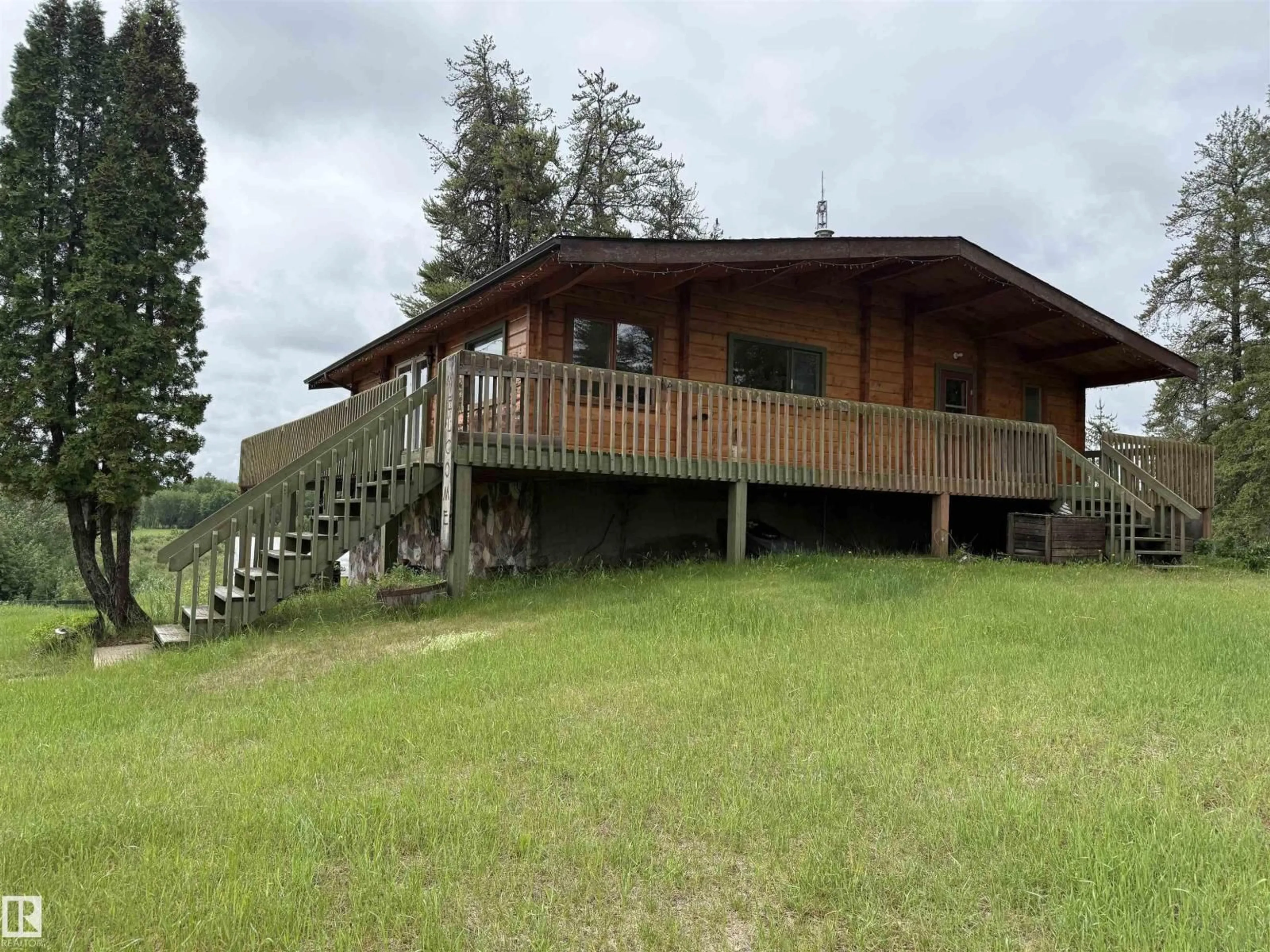 A pic from outside/outdoor area/front of a property/back of a property/a pic from drone, building for 621088 RGE RD 53 NE, Rural Woodlands County Alberta T0G1A0