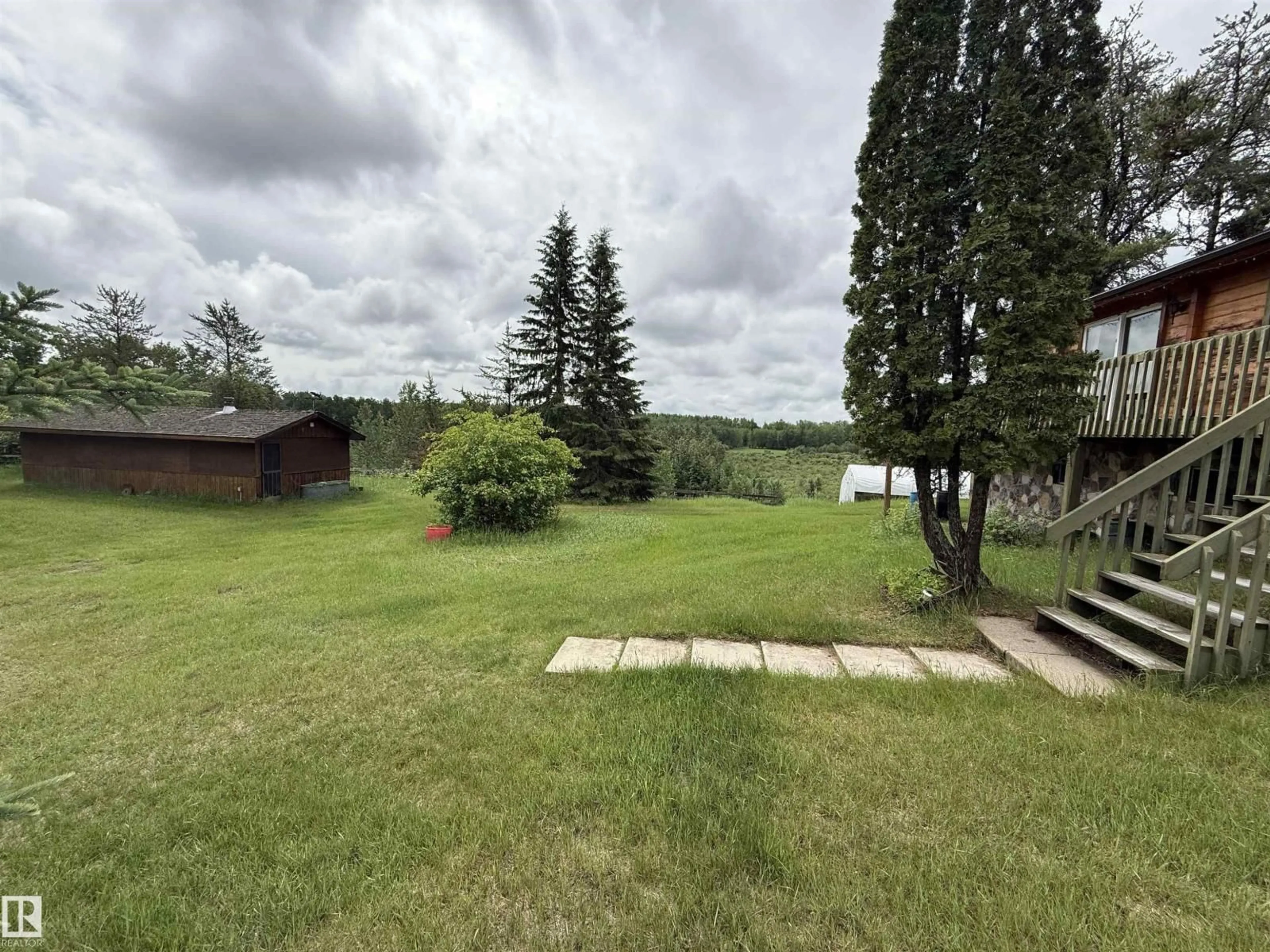 A pic from outside/outdoor area/front of a property/back of a property/a pic from drone, water/lake/river/ocean view for 621088 RGE RD 53 NE, Rural Woodlands County Alberta T0G1A0