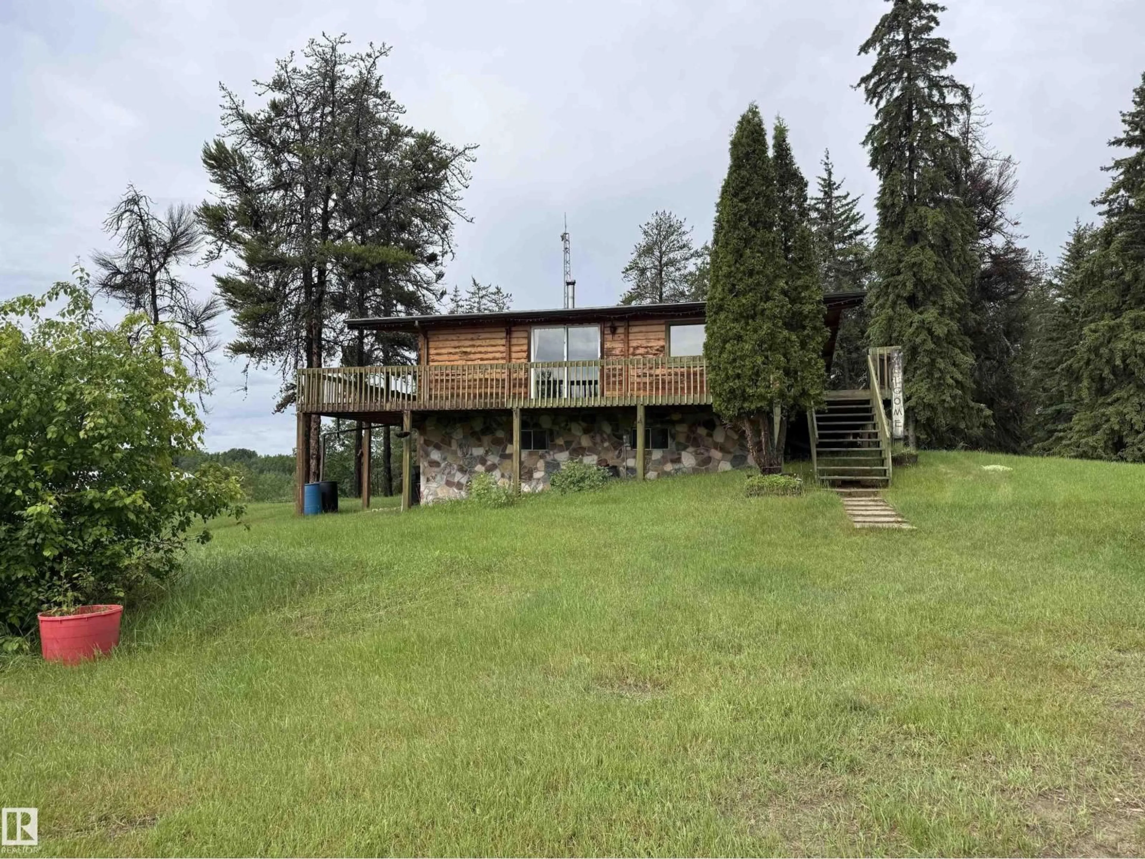 A pic from outside/outdoor area/front of a property/back of a property/a pic from drone, water/lake/river/ocean view for 621088 RGE RD 53 NE, Rural Woodlands County Alberta T0G1A0