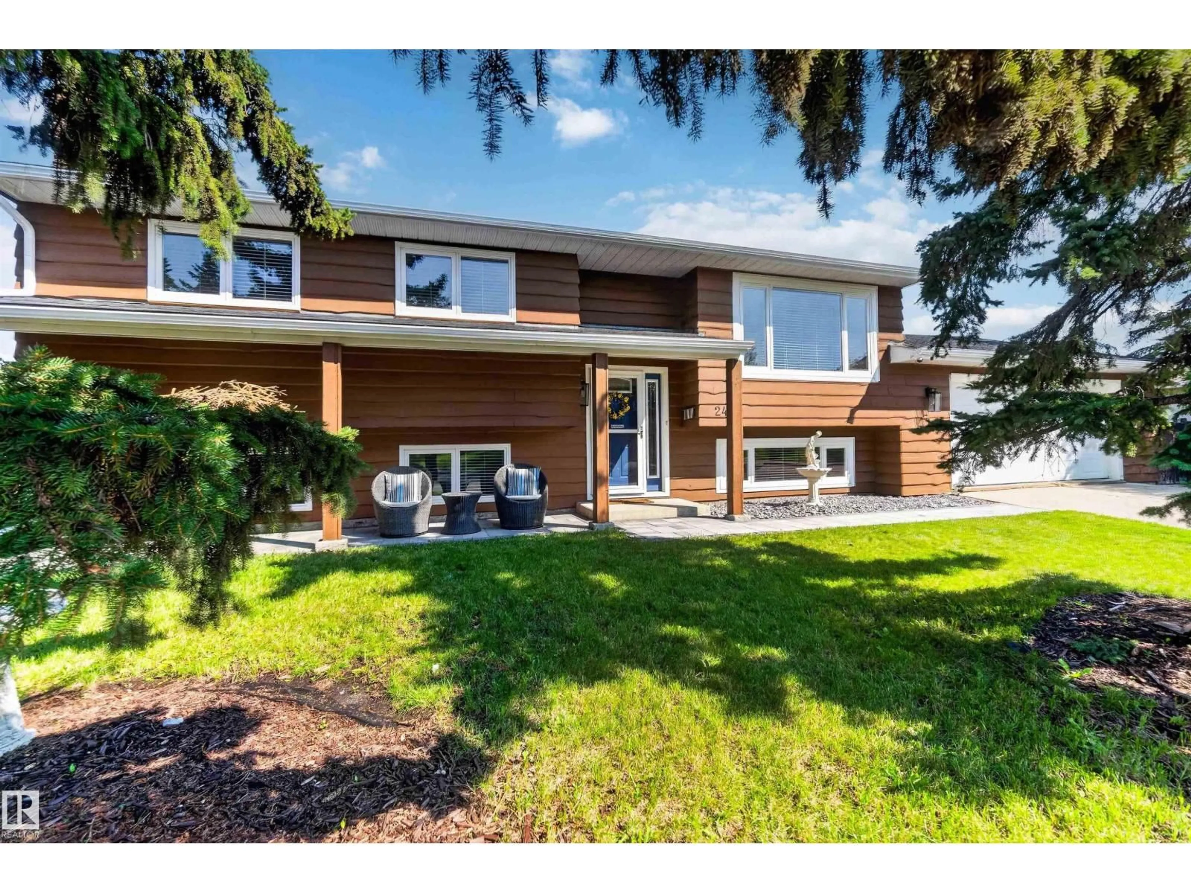 Home with brick exterior material, street for 2428 142 AV, Edmonton Alberta T5Y1R2