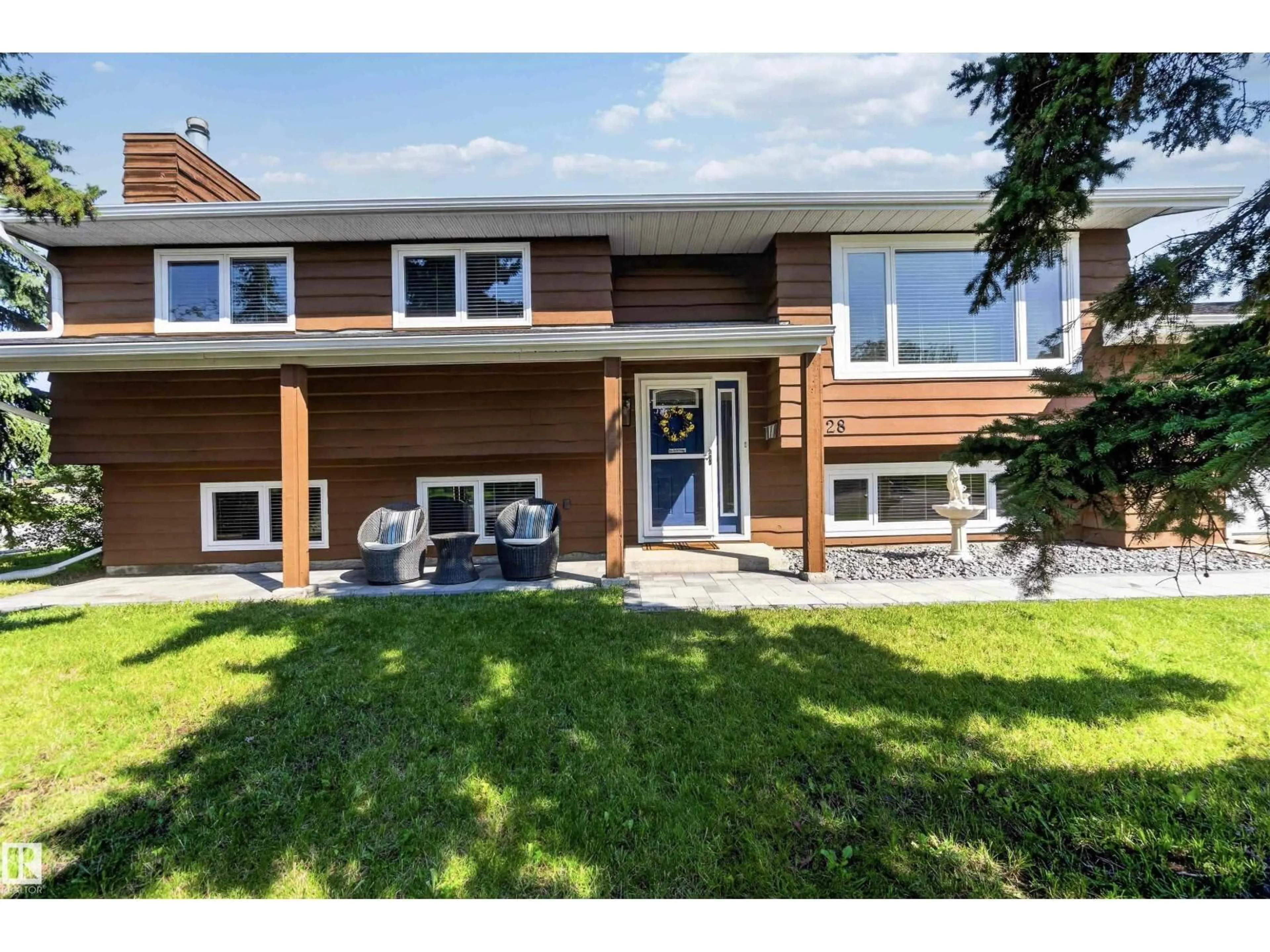 Home with brick exterior material, street for 2428 142 AV, Edmonton Alberta T5Y1R2