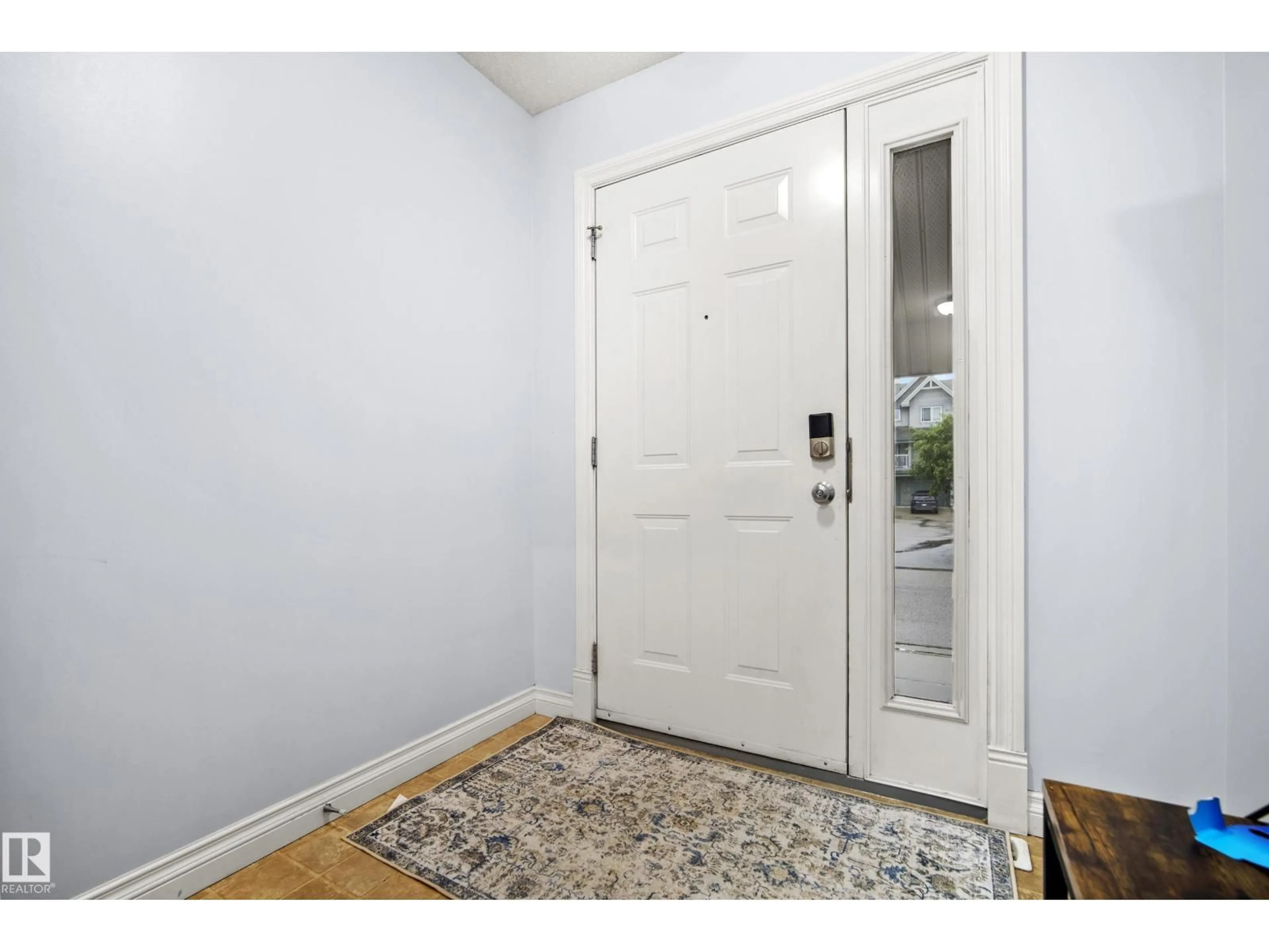 Indoor entryway for #6 - 12050 17 AV, Edmonton Alberta T6W1X4