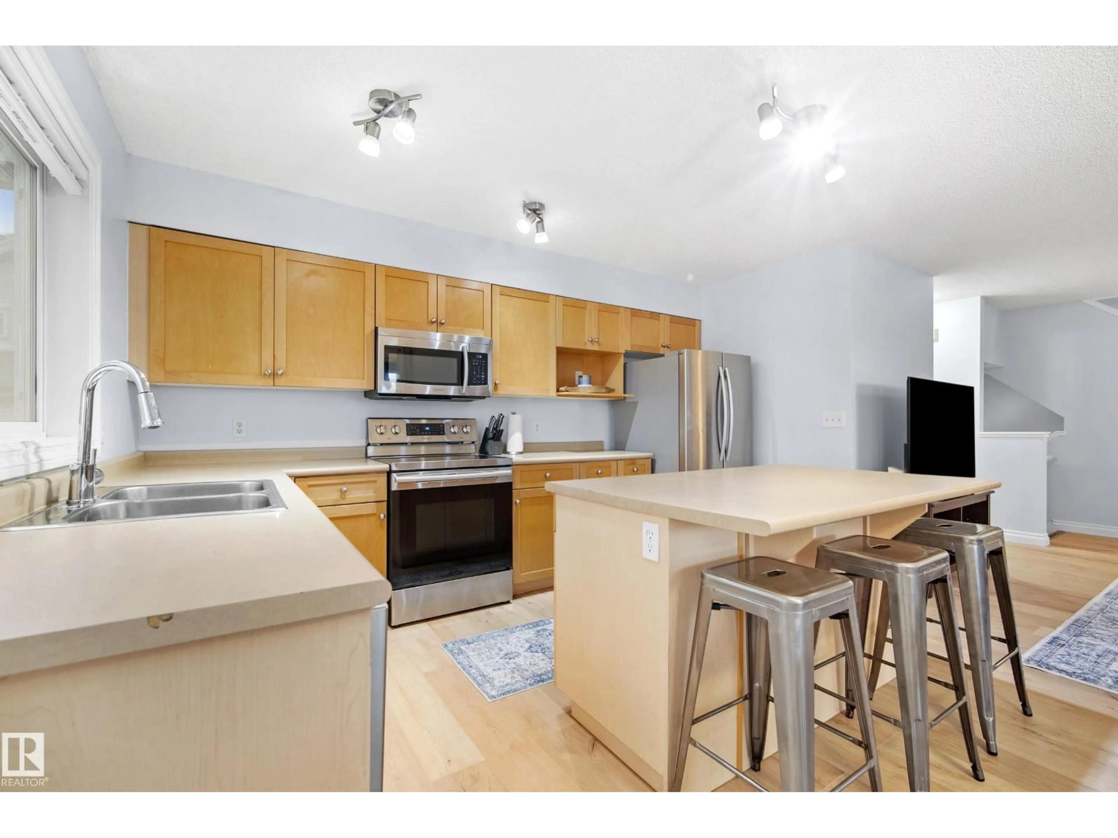 Open concept kitchen, unknown for #6 - 12050 17 AV, Edmonton Alberta T6W1X4