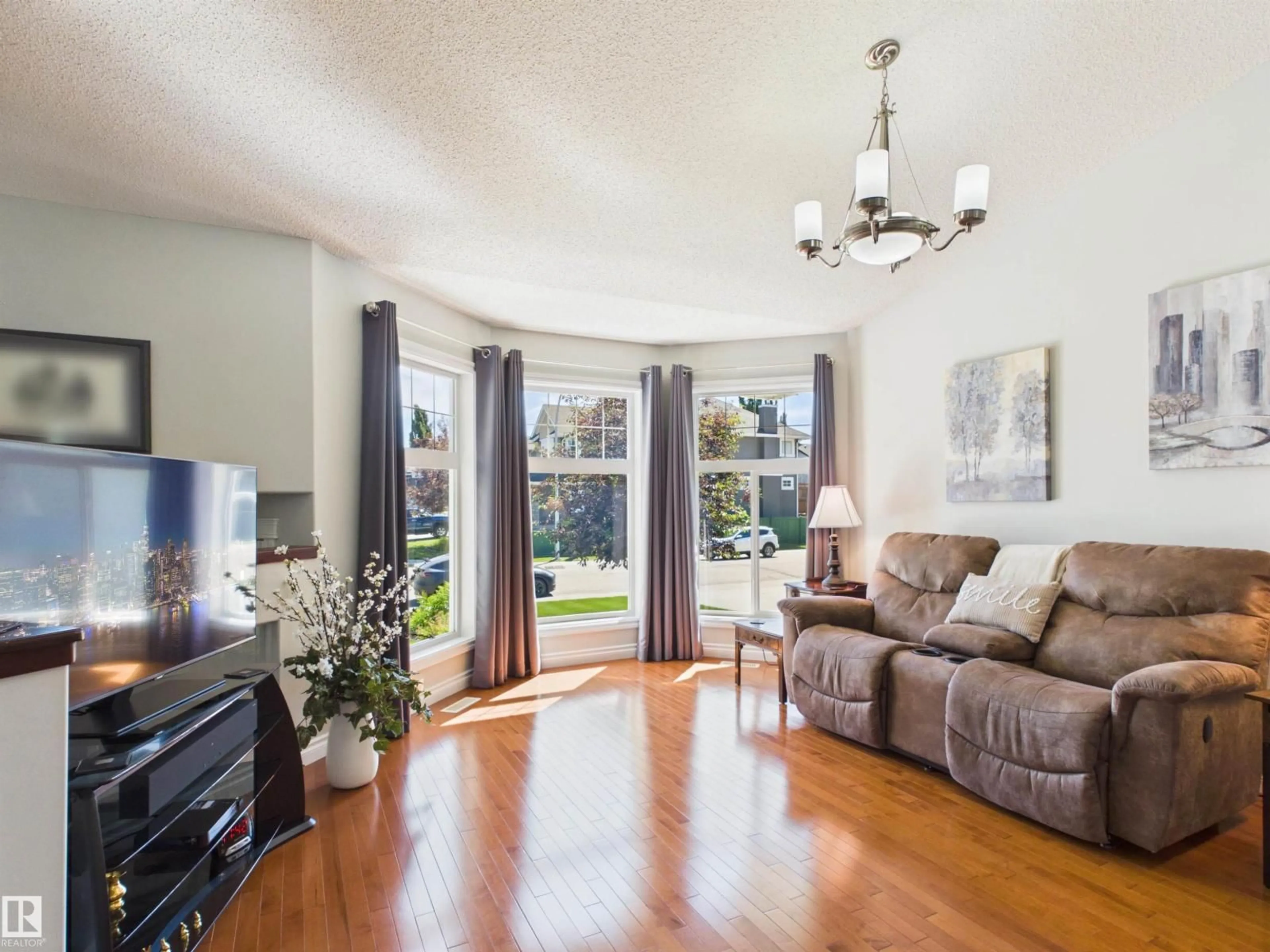 Living room with furniture, wood/laminate floor for 2043 CHRISTOPHER CL, Sherwood Park Alberta T8H0M9