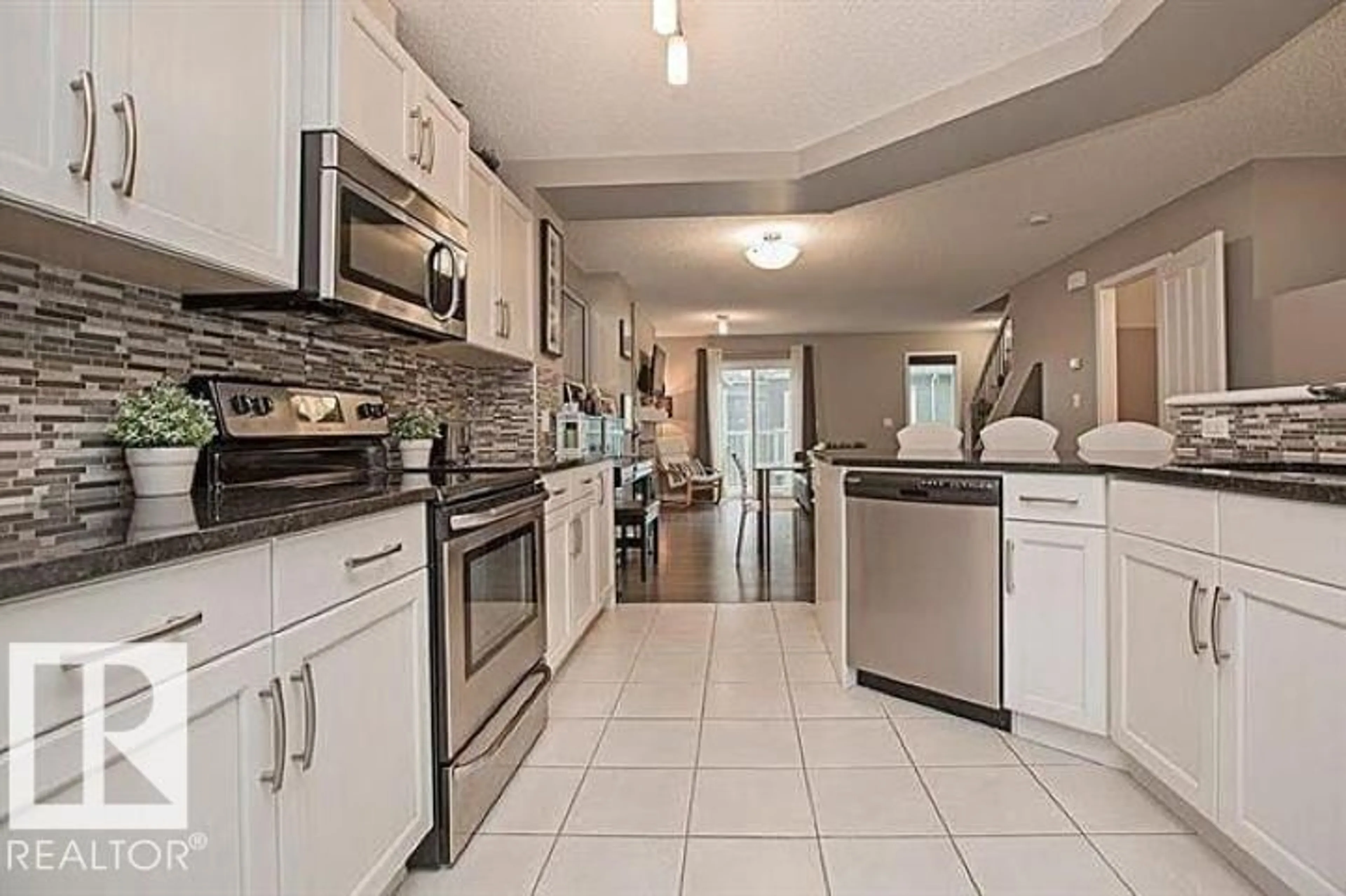 Open concept kitchen, ceramic/tile floor for #95 - 4050 SAVARYN DR, Edmonton Alberta T6X1R8