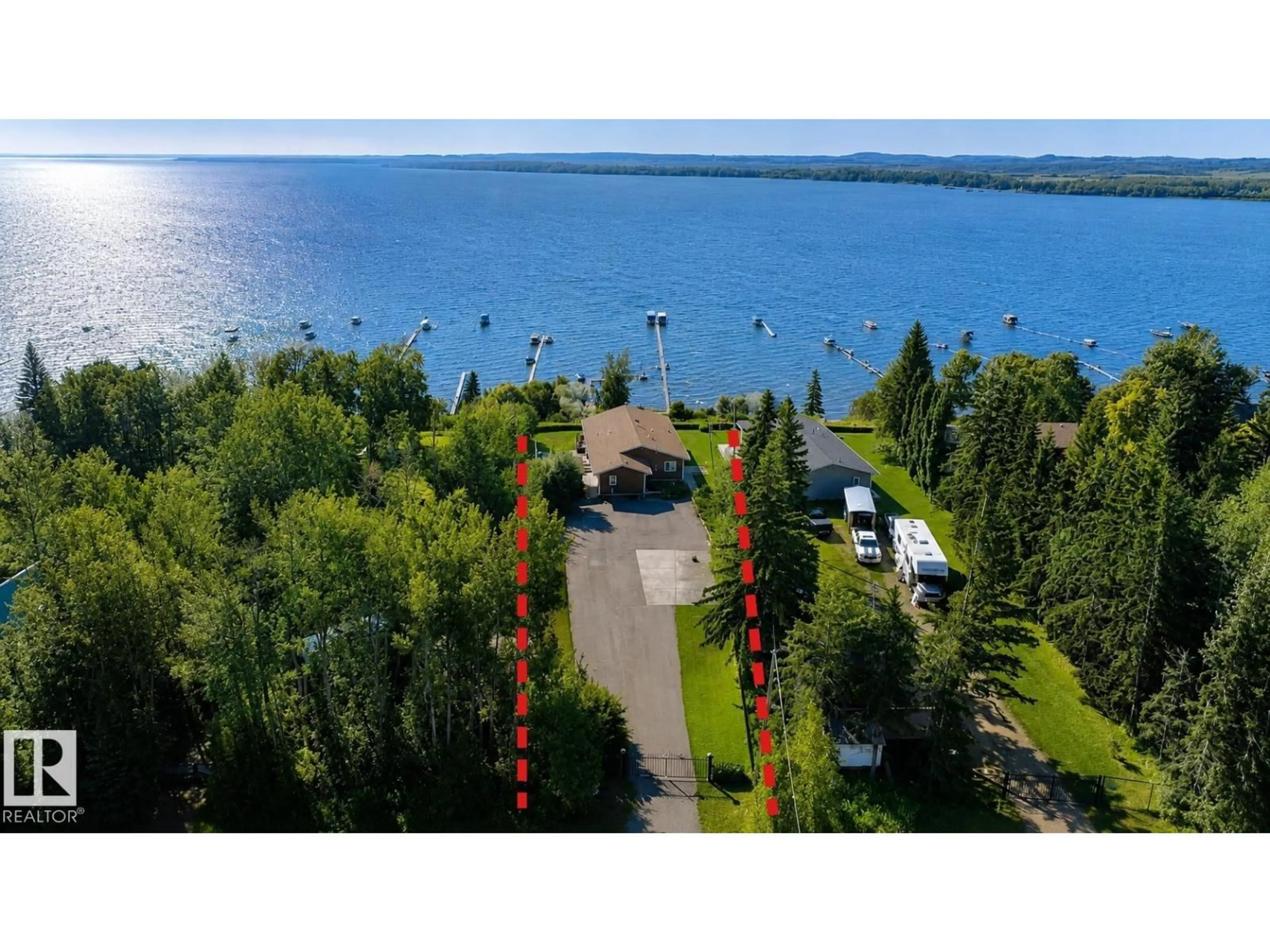 A pic from outside/outdoor area/front of a property/back of a property/a pic from drone, water/lake/river/ocean view for 39 CULMAC RD, Rural Parkland County Alberta T0E2B0