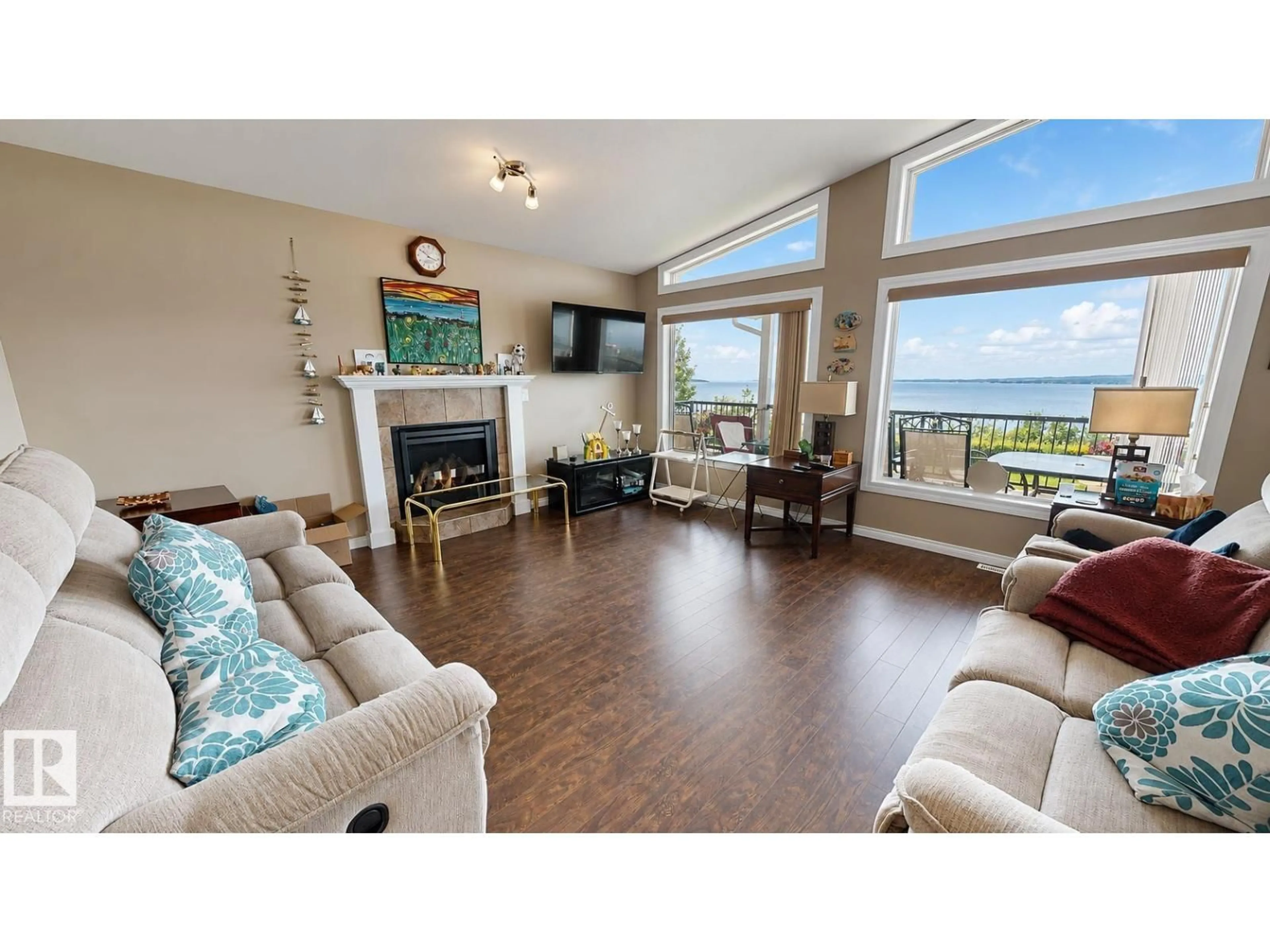 Living room with furniture, wood/laminate floor for 39 CULMAC RD, Rural Parkland County Alberta T0E2B0
