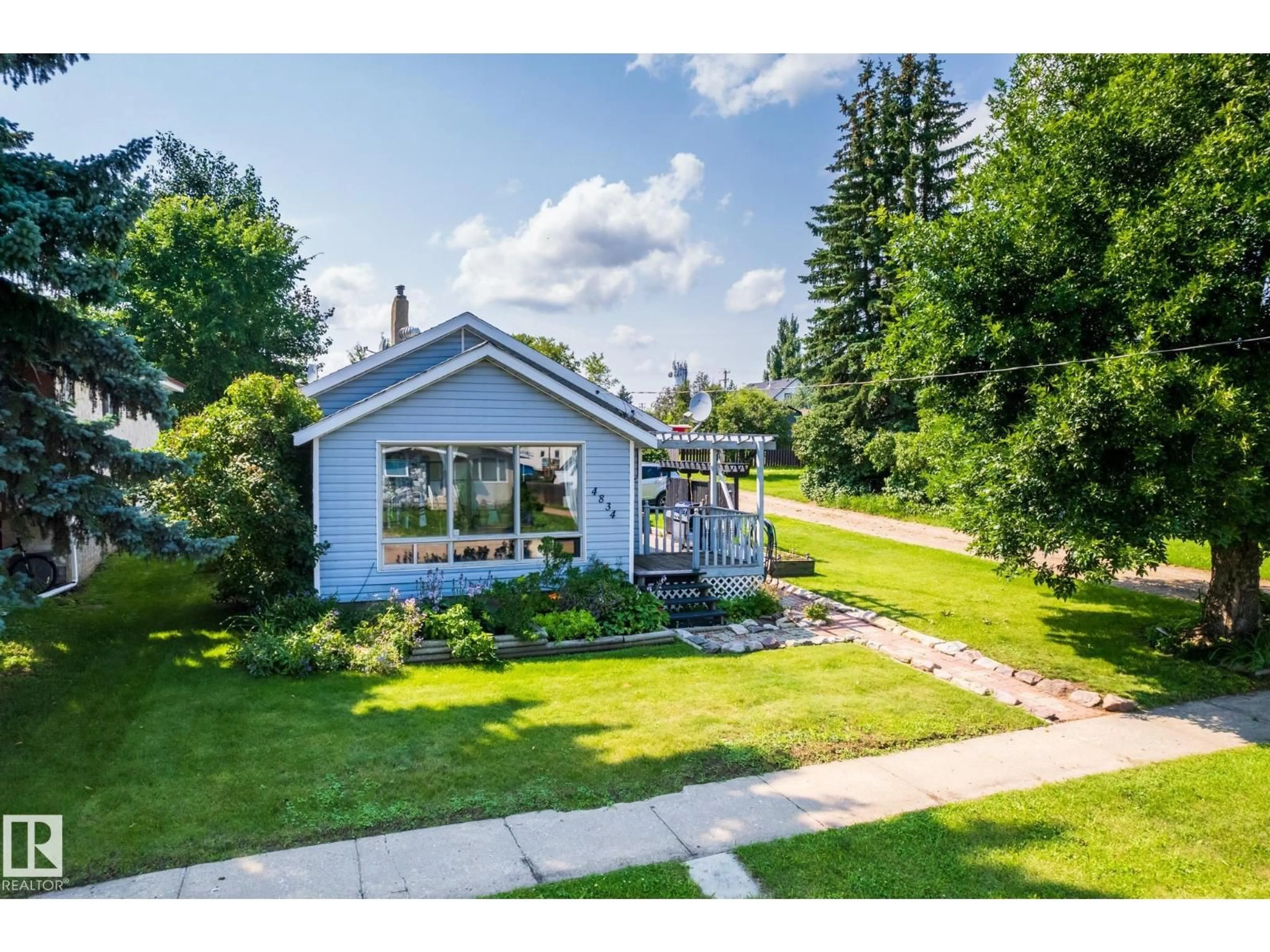 A pic from outside/outdoor area/front of a property/back of a property/a pic from drone, street for 4834 51 ST, Legal Alberta T0G1L0