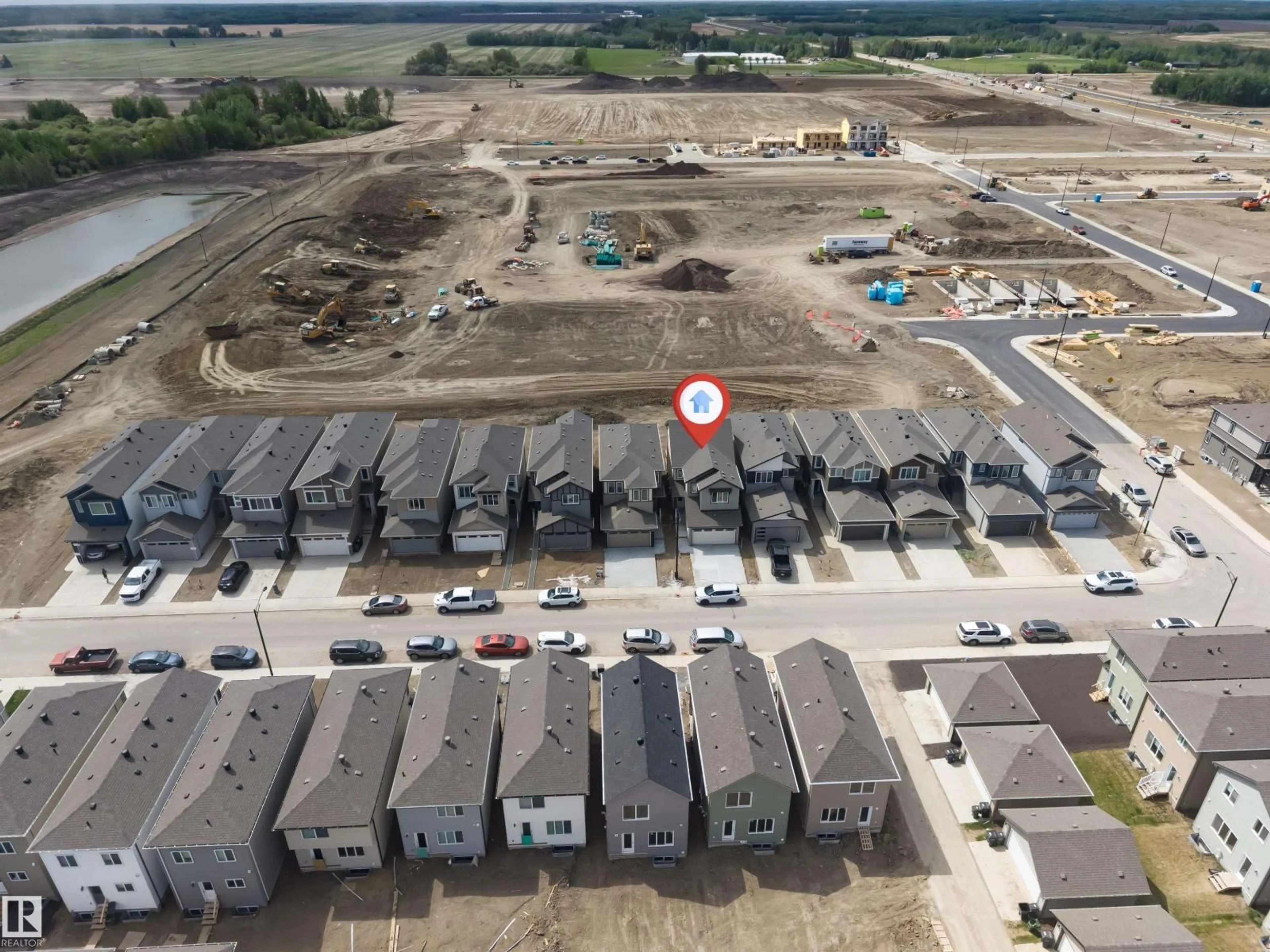 A pic from outside/outdoor area/front of a property/back of a property/a pic from drone, street for NW - 1972 210 ST, Edmonton Alberta T6M3H5