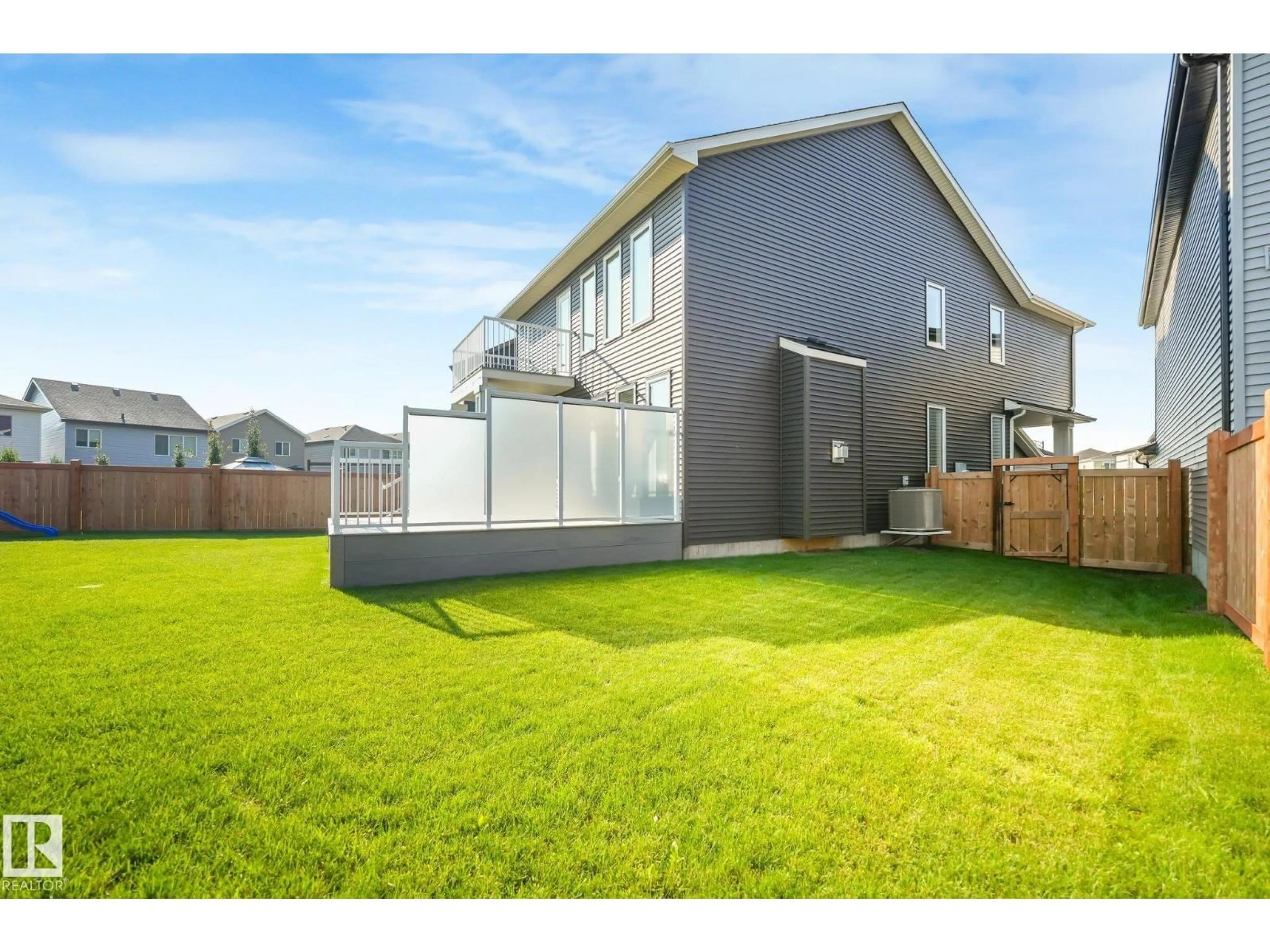 A pic from outside/outdoor area/front of a property/back of a property/a pic from drone, street for 6404 176 AV, Edmonton Alberta T5Y4A9