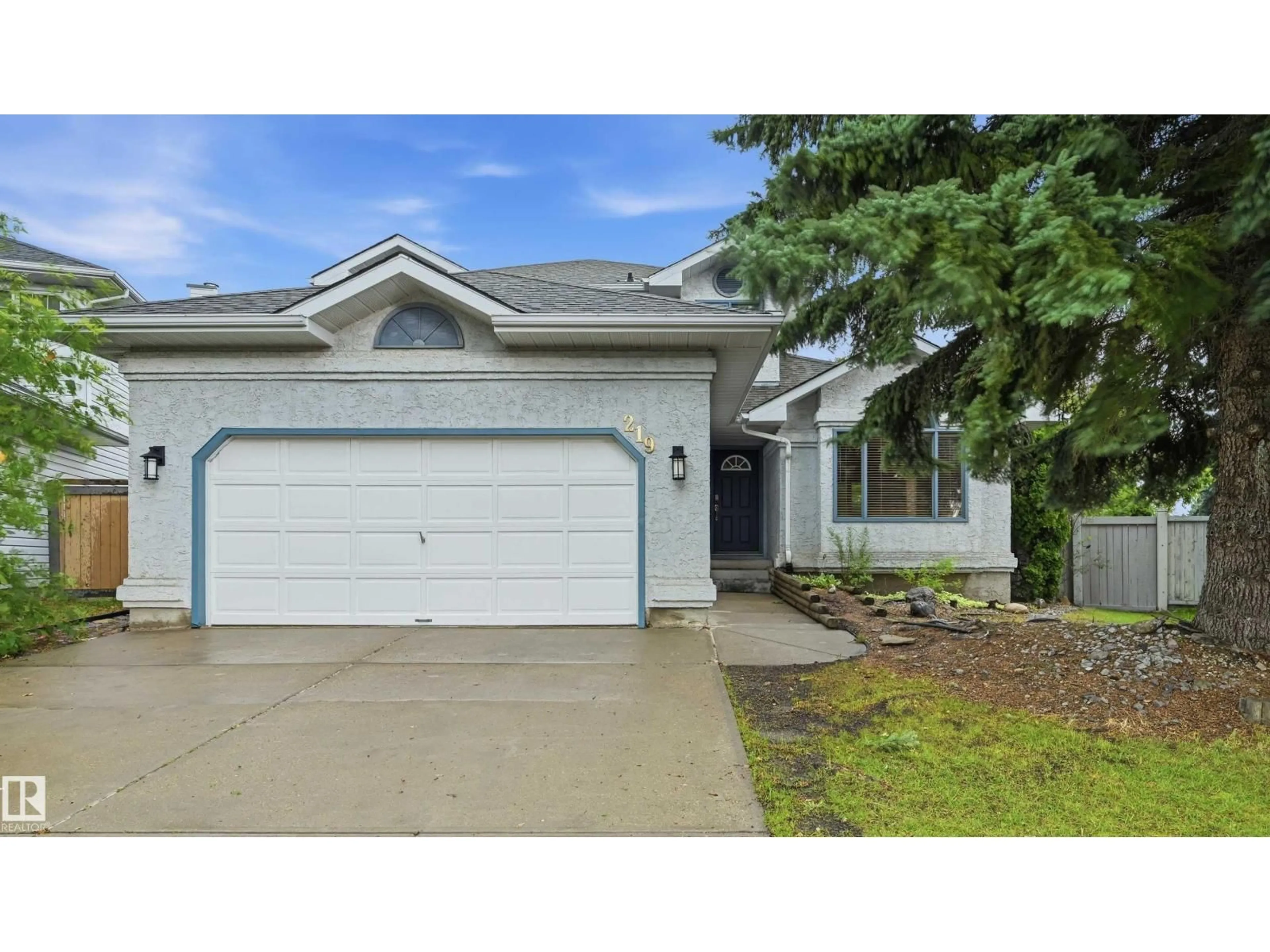 Home with vinyl exterior material, street for 219 BUCHANAN CL, Edmonton Alberta T6R2B7