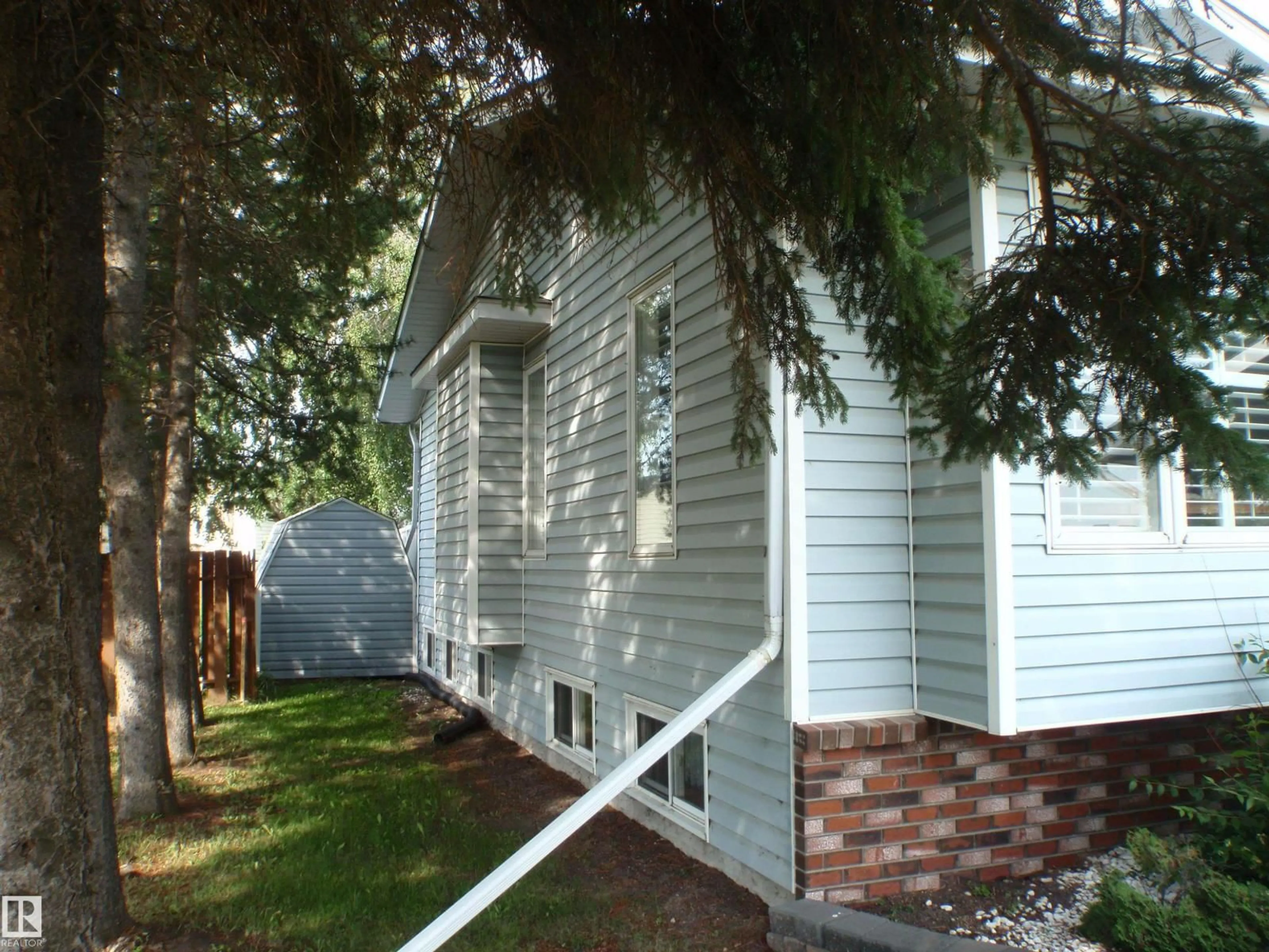 Home with vinyl exterior material, street for 5802 53 ST, Barrhead Alberta T7N1N1