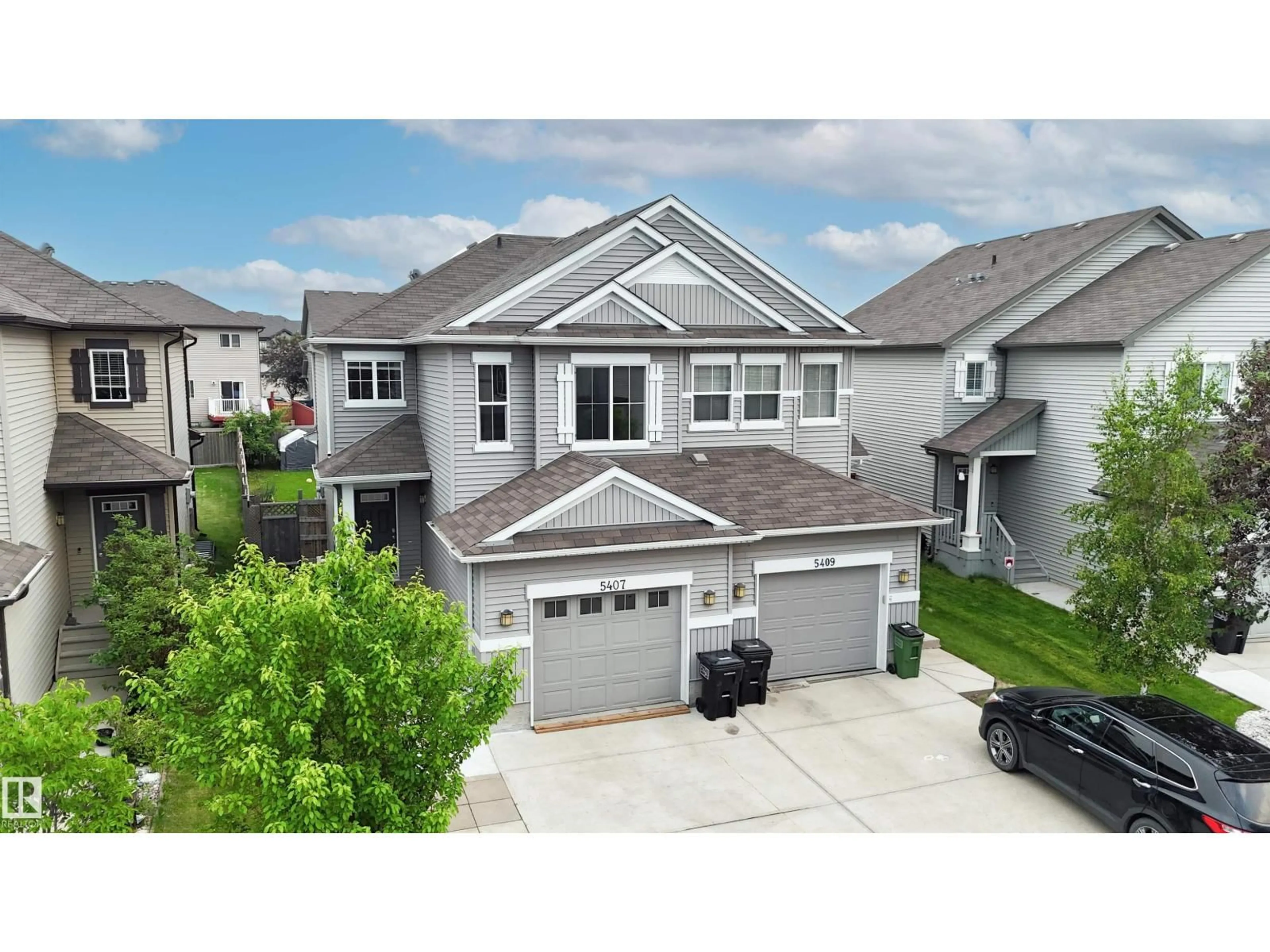 A pic from outside/outdoor area/front of a property/back of a property/a pic from drone, street for 5407 14 AV, Edmonton Alberta T6X1S2