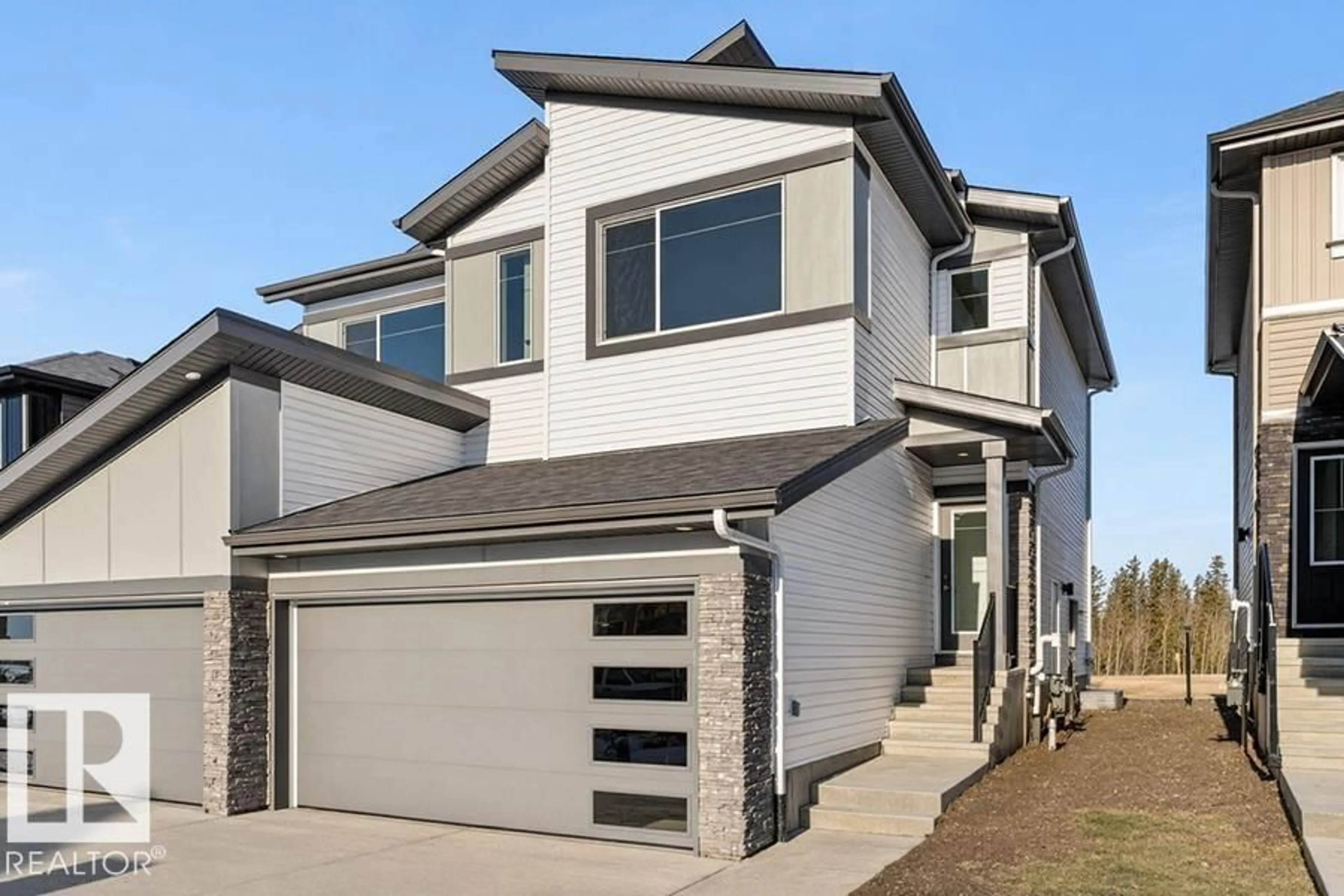 Home with vinyl exterior material, street for 4182 KINGLET DR, Edmonton Alberta T5S0W1