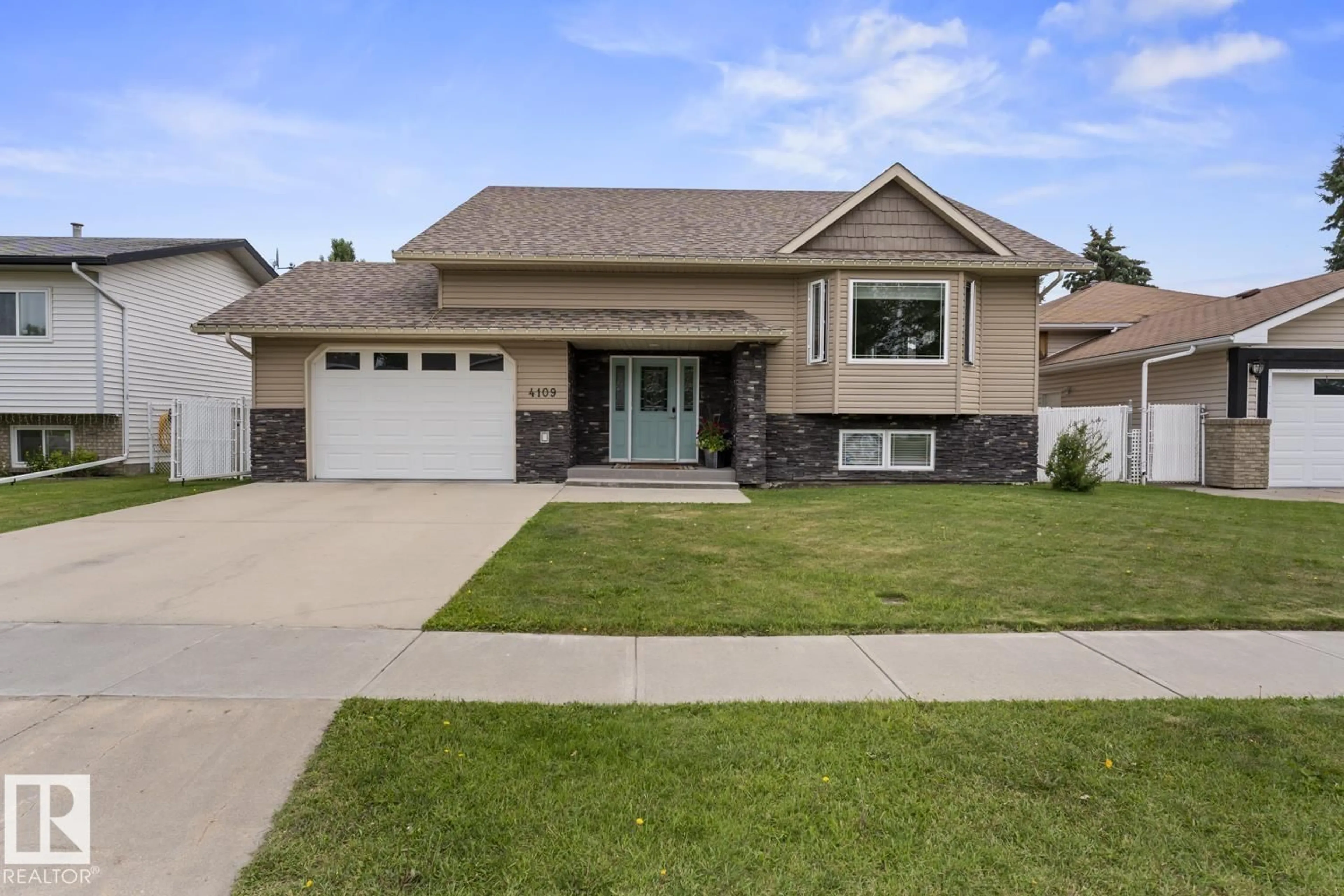 Home with vinyl exterior material, street for 4109 40 ST, Bonnyville Town Alberta T9N1T5