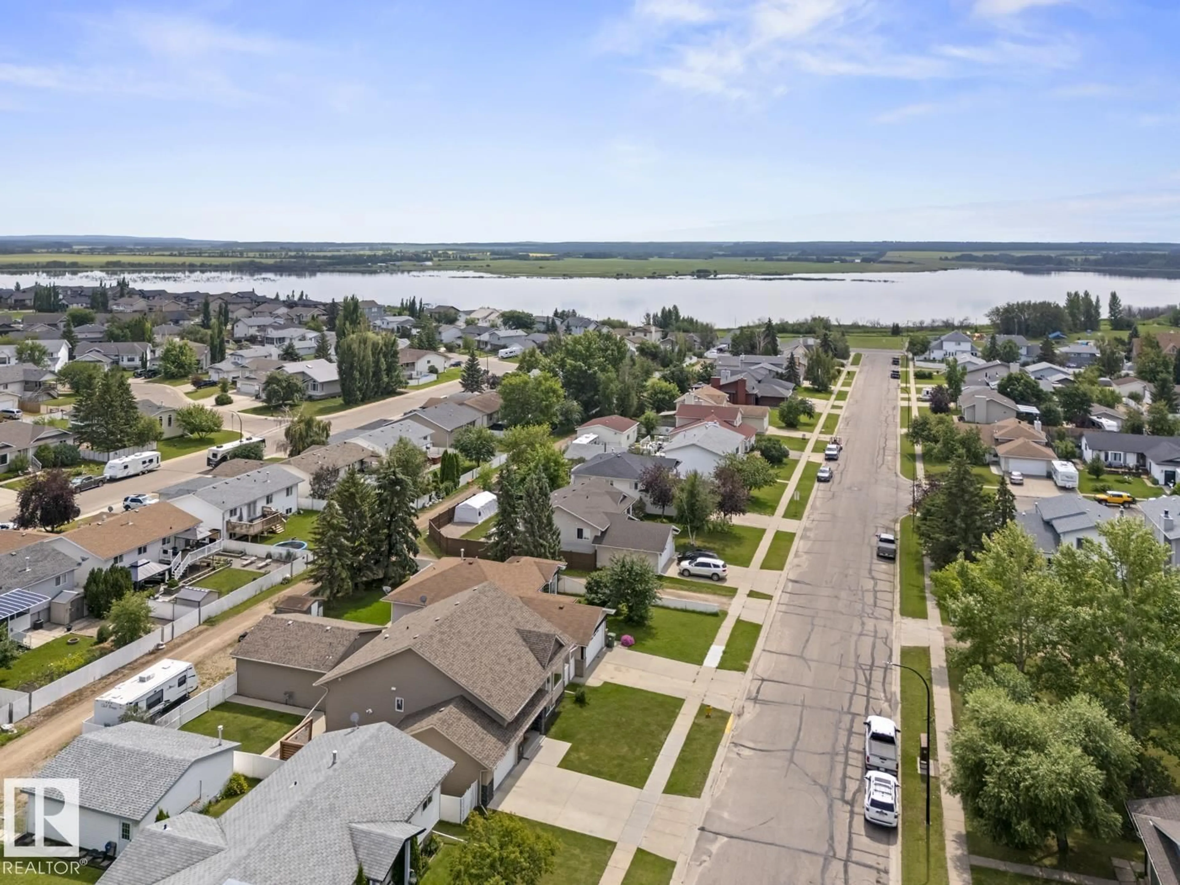 A pic from outside/outdoor area/front of a property/back of a property/a pic from drone, water/lake/river/ocean view for 4109 40 ST, Bonnyville Town Alberta T9N1T5