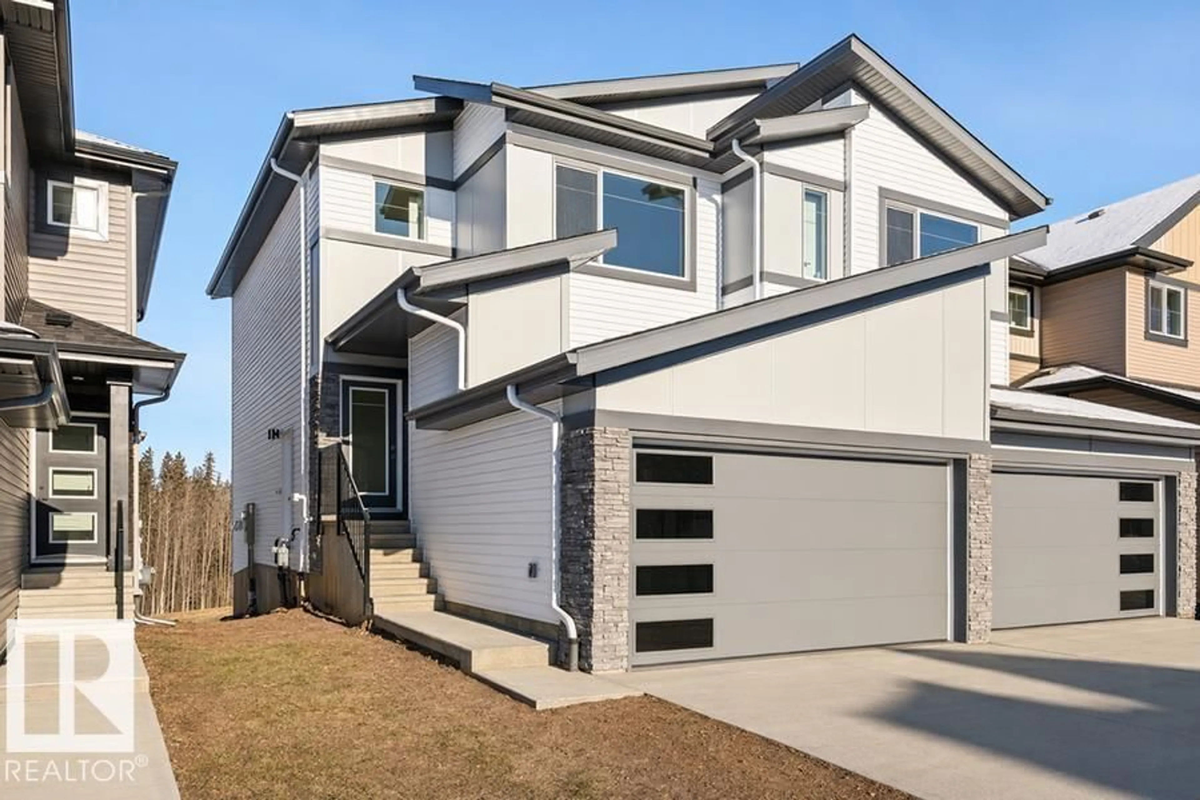 Home with vinyl exterior material, street for 4184 KINGLET DR, Edmonton Alberta T5S0W1