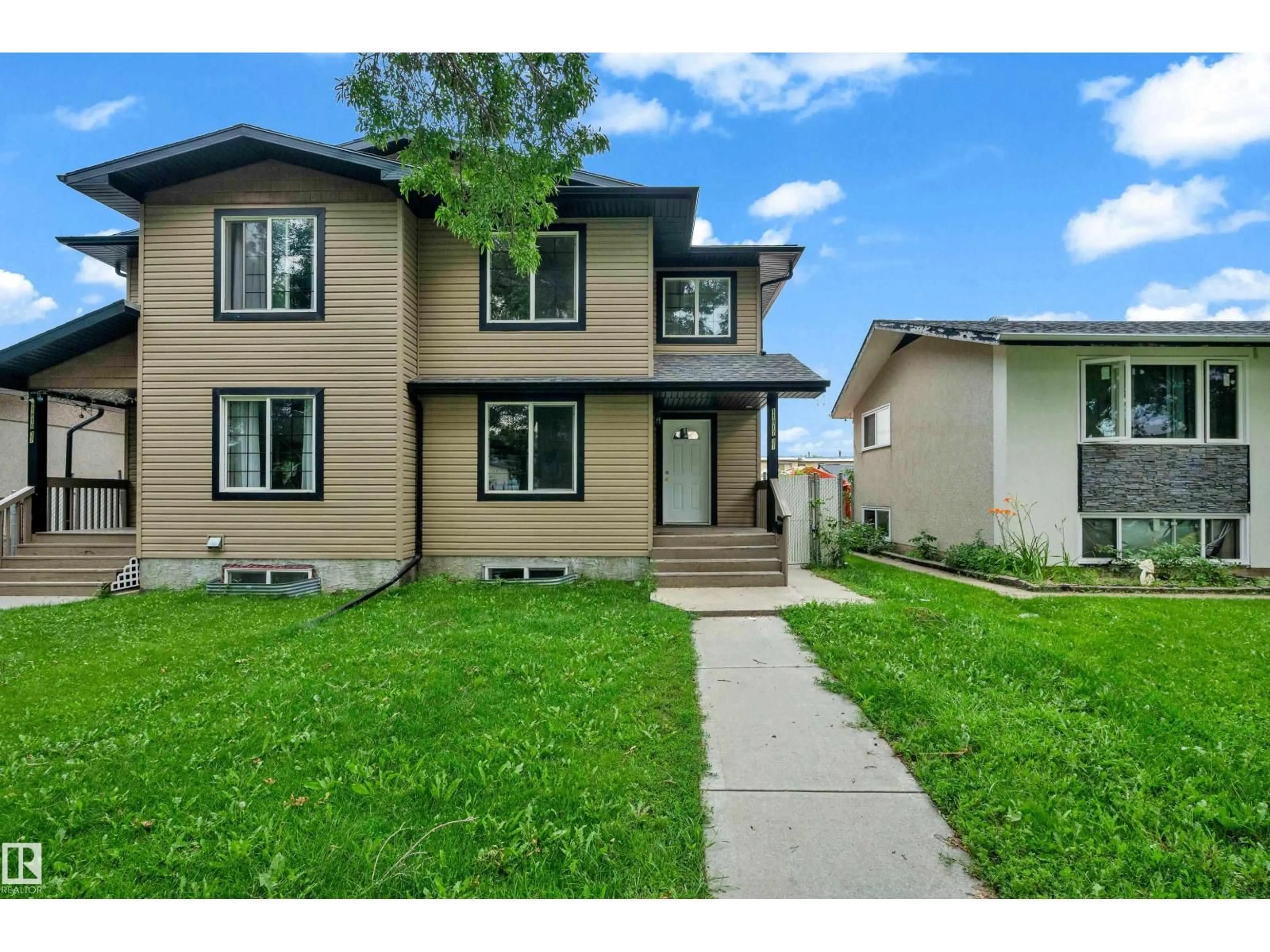 Home with vinyl exterior material, street for 11817 37 ST, Edmonton Alberta T5W2B7
