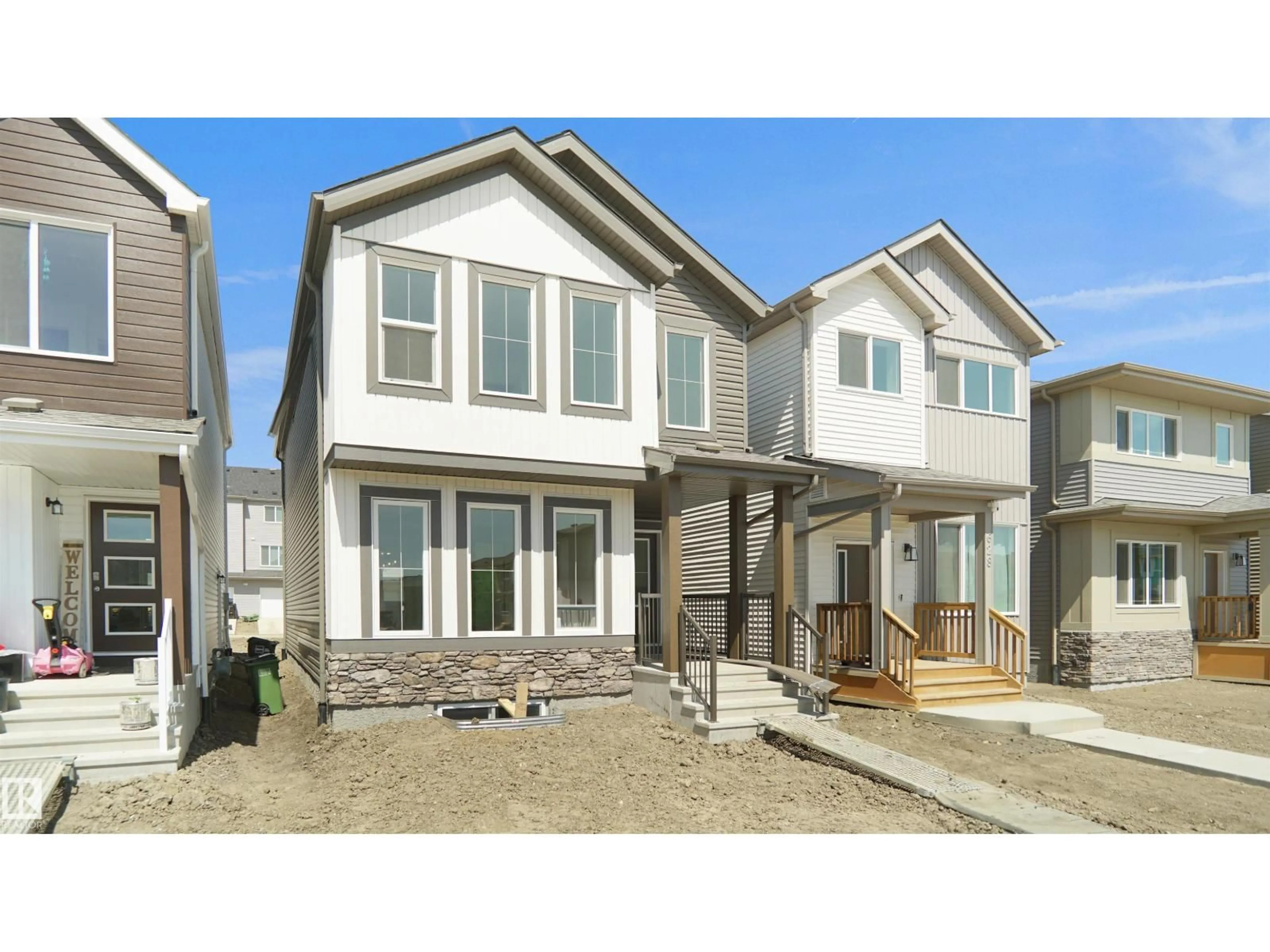 Home with vinyl exterior material, street for SW - 7387 KEELER CR, Edmonton Alberta T6W4J9
