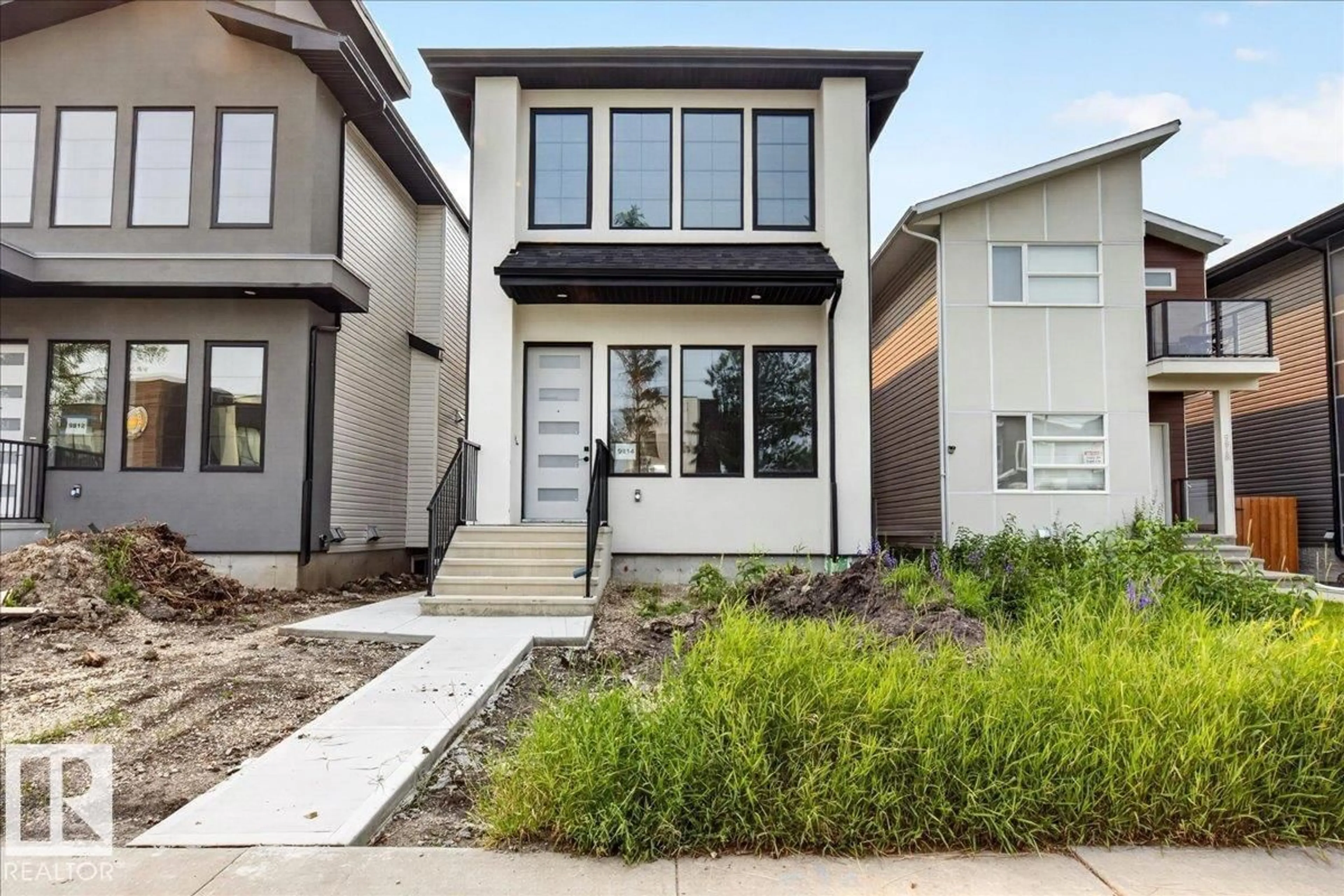 Home with vinyl exterior material, street for 9814 155 ST NW, Edmonton Alberta T5P2K9