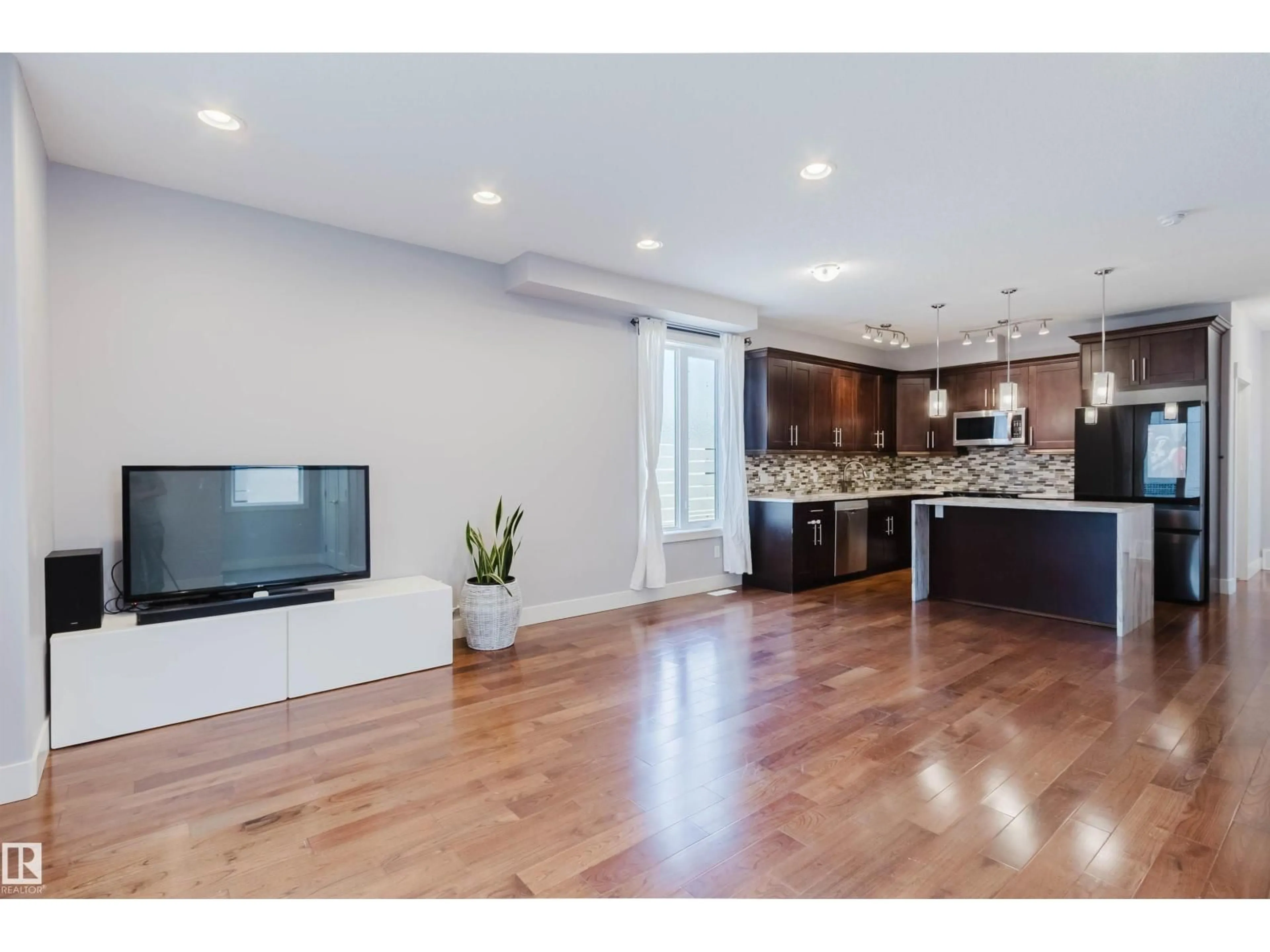 Open concept kitchen, unknown for 10626 81 AV, Edmonton Alberta T6E1X9