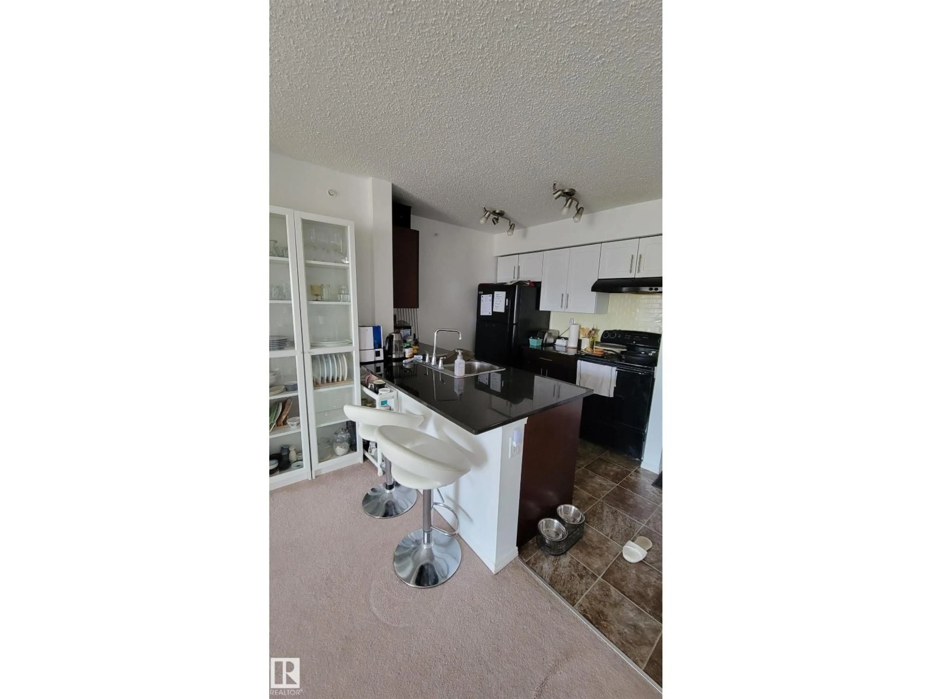 Open concept kitchen, unknown for #415 - 12045 22 AV, Edmonton Alberta T6W2Y2