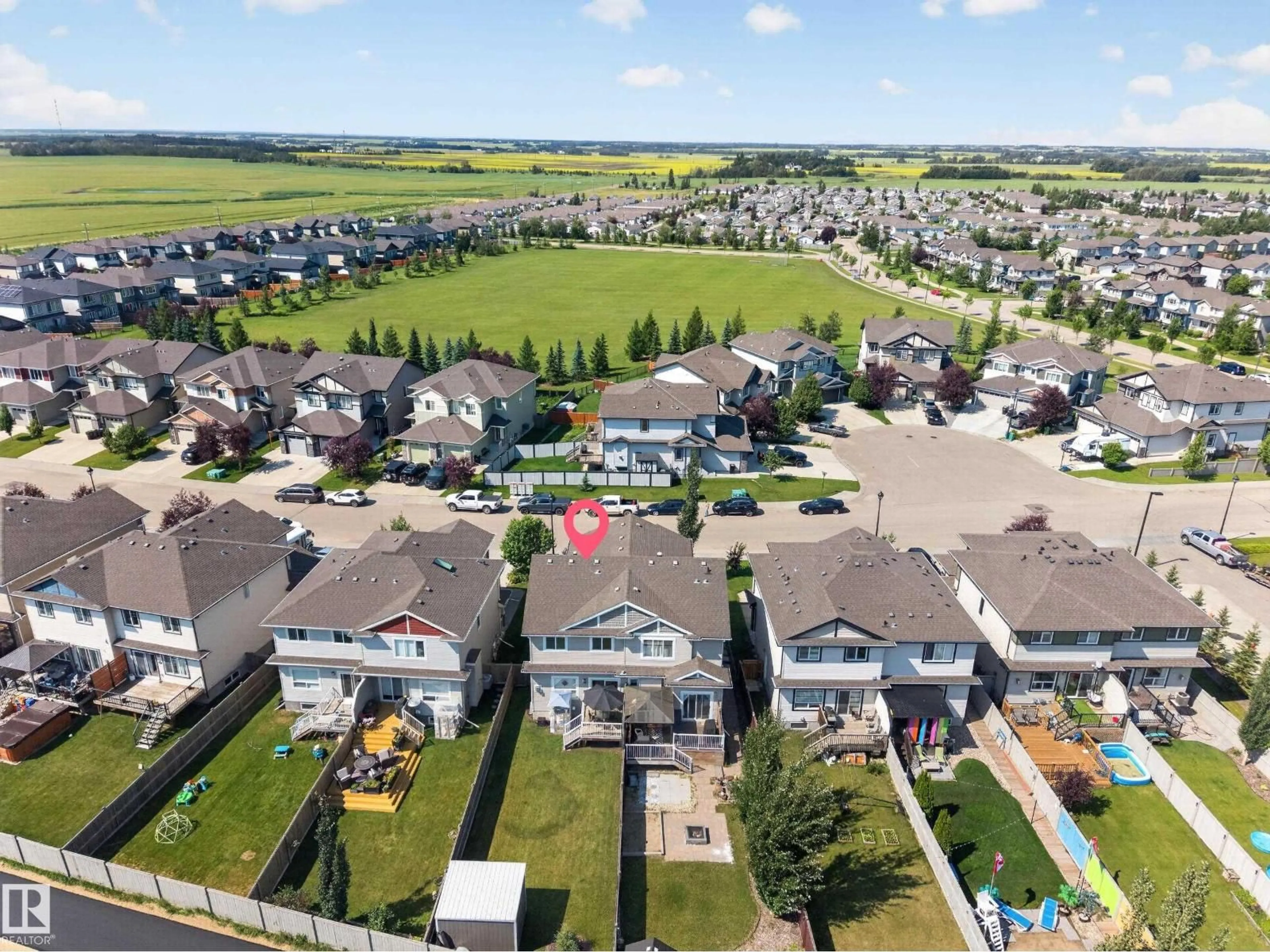A pic from outside/outdoor area/front of a property/back of a property/a pic from drone, mountain view for 89 SANDALWOOD PLACE, Leduc Alberta T9E1C4