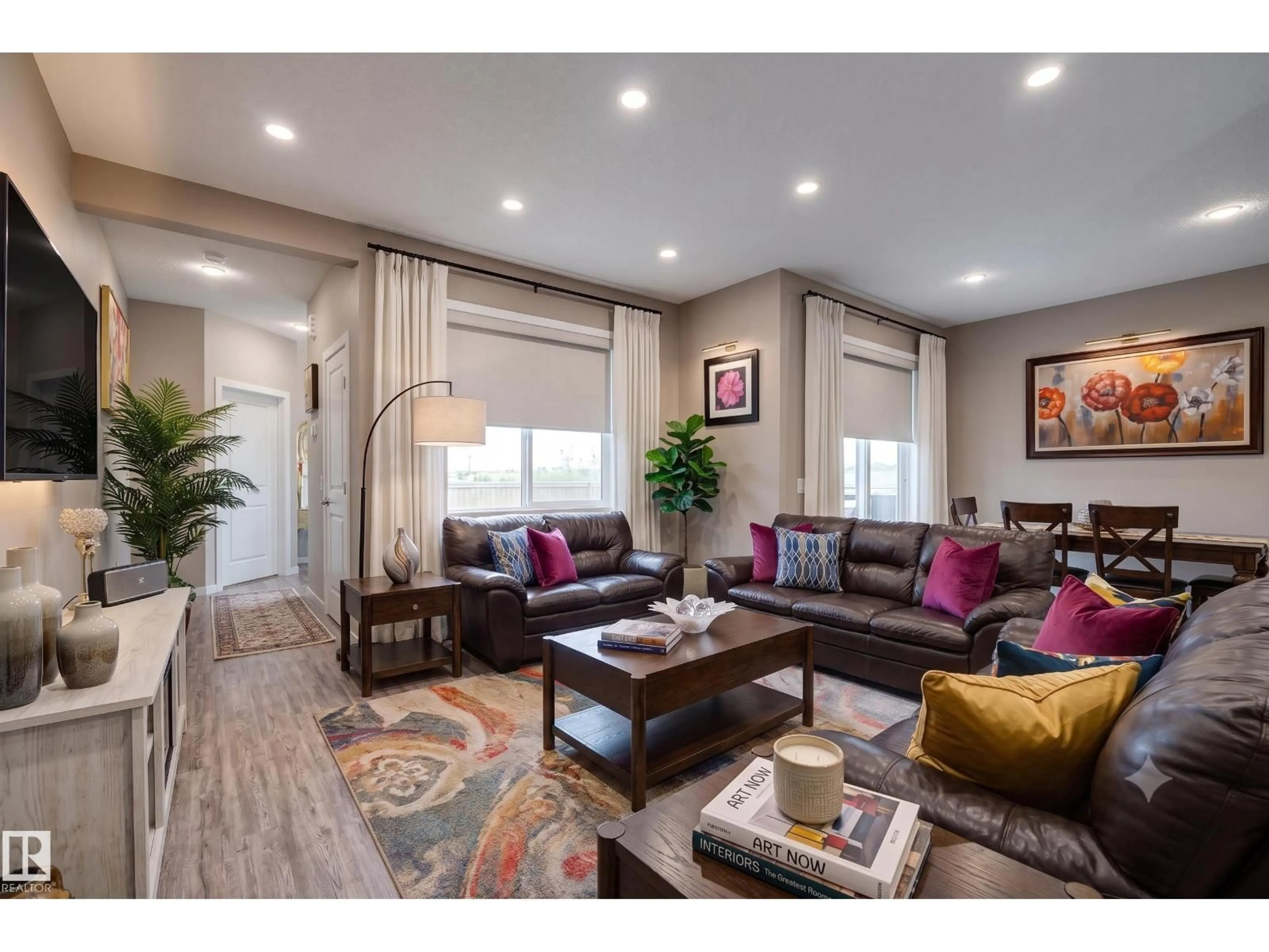 Living room with furniture, wood/laminate floor for 22419 80 AV, Edmonton Alberta T5T7H8