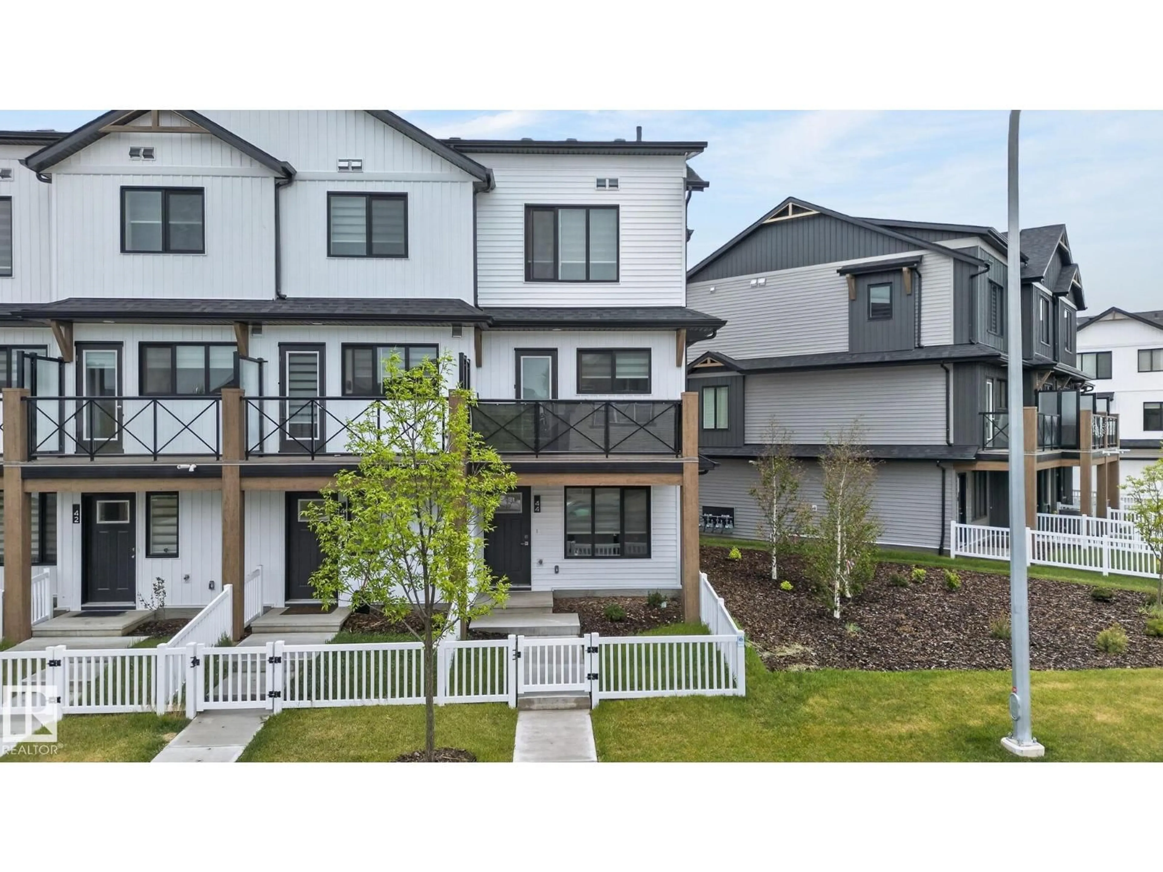 A pic from outside/outdoor area/front of a property/back of a property/a pic from drone, street for #44 - 1025 SECORD PM NW, Edmonton Alberta T5T7V4