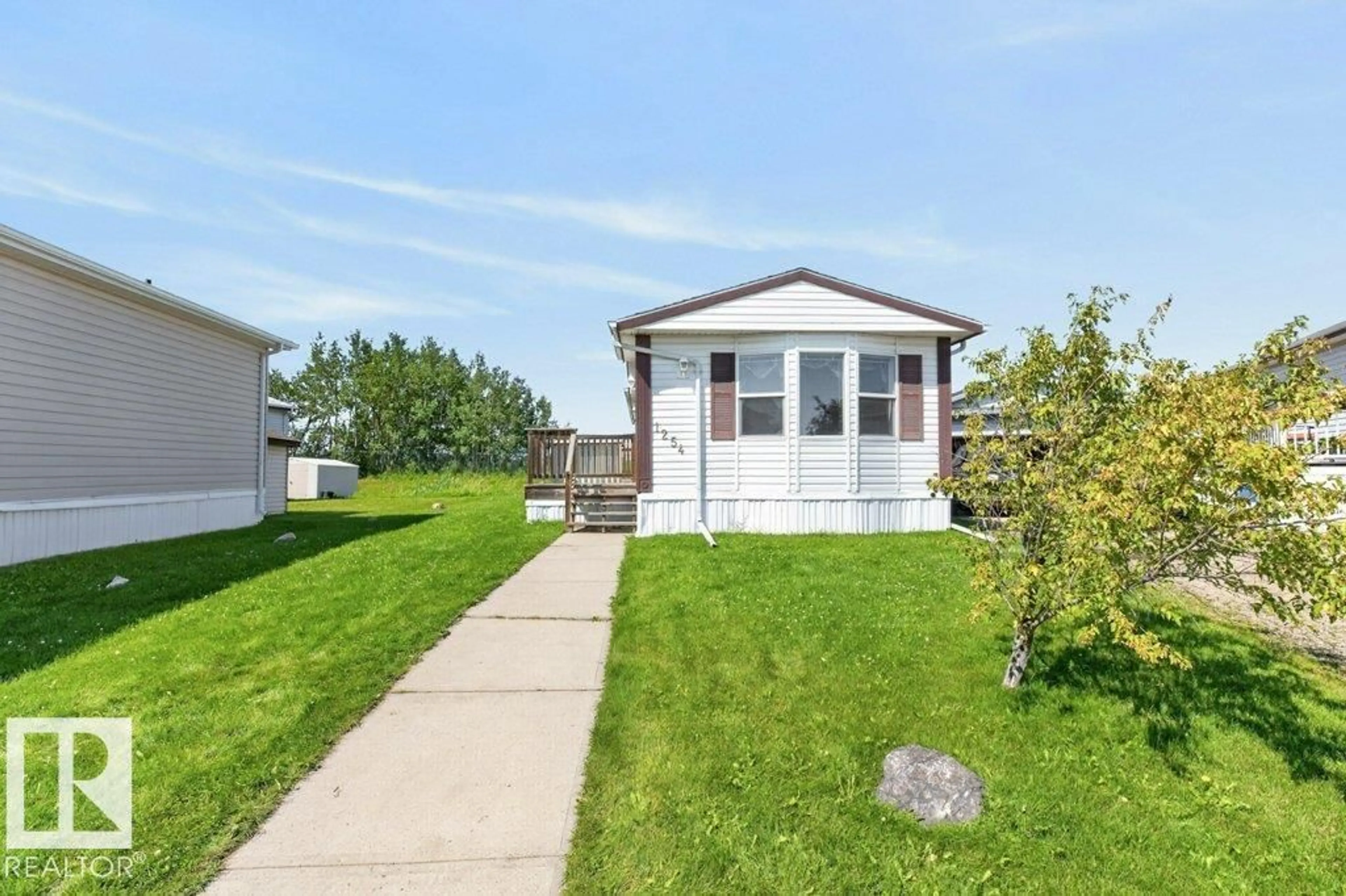 Home with vinyl exterior material, street for 53222 - 1254 RANGE ROAD 272, Rural Parkland County Alberta T7X4K4