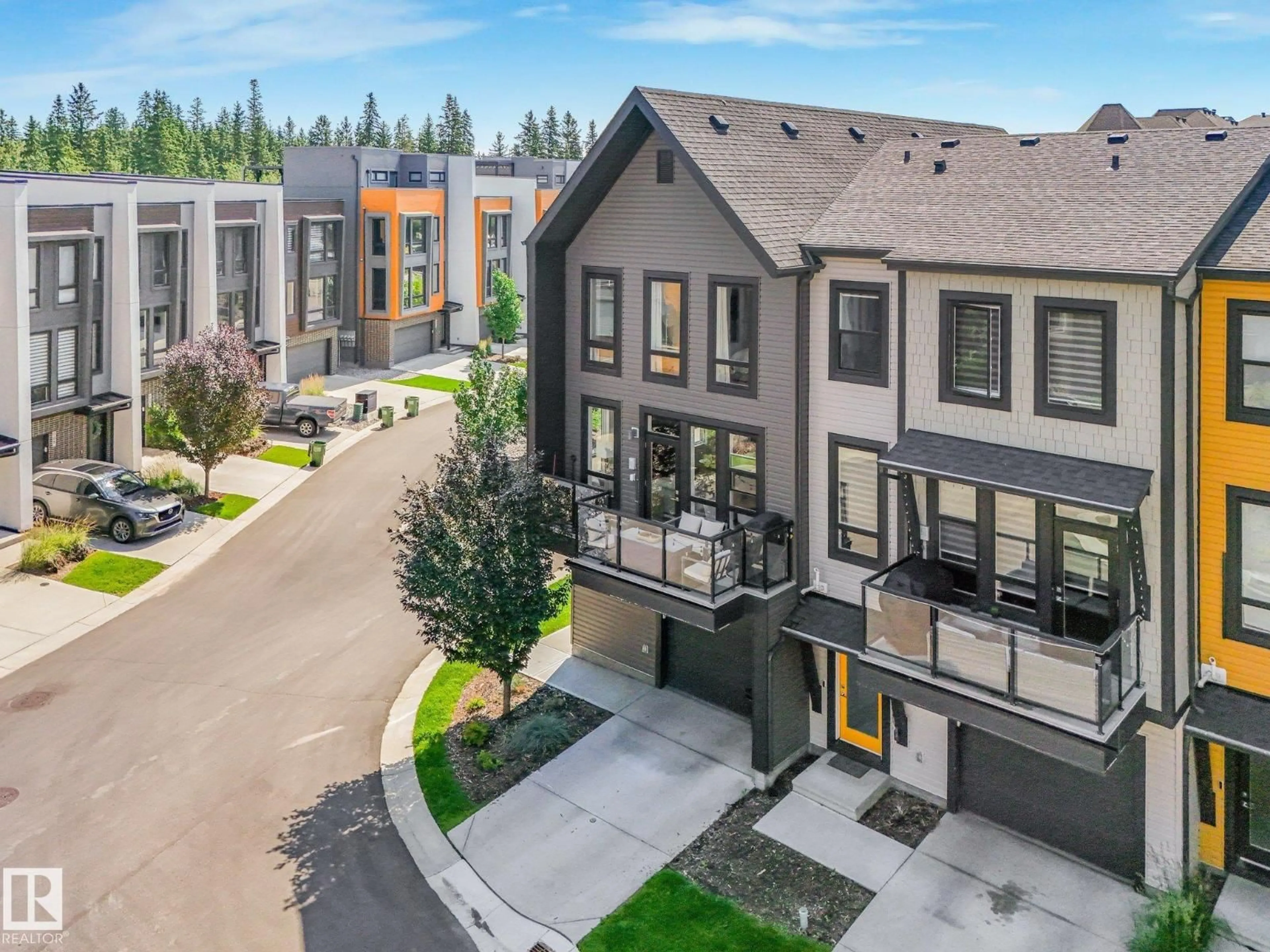 A pic from outside/outdoor area/front of a property/back of a property/a pic from drone, mountain view for #106 - 1304 RUTHERFORD RD, Edmonton Alberta T6W0B4