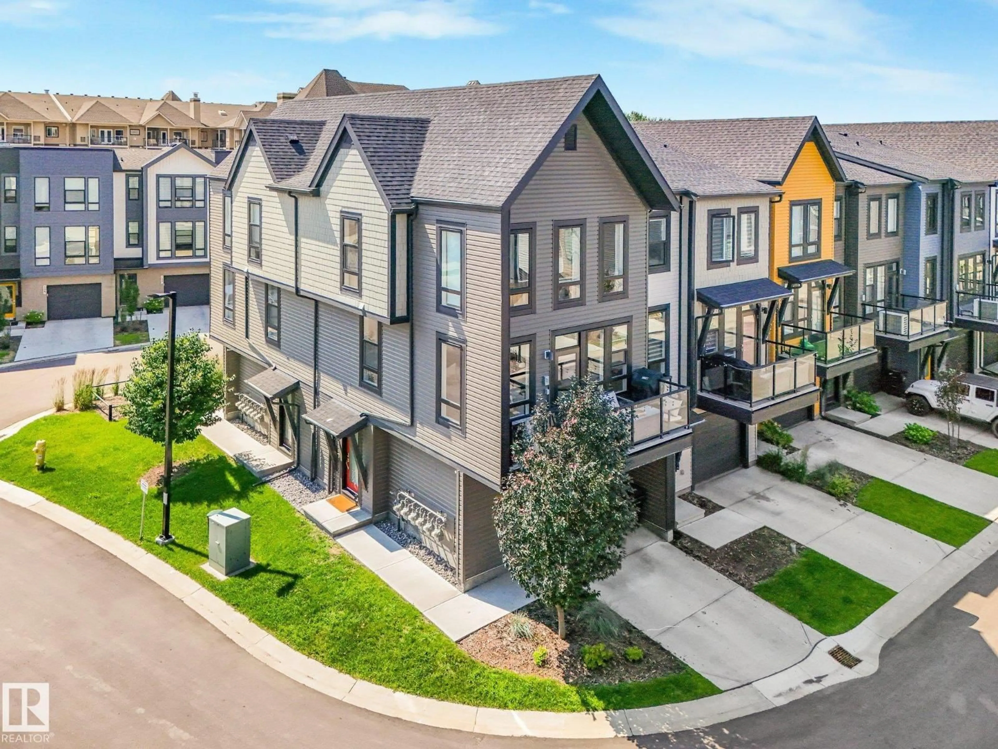 A pic from outside/outdoor area/front of a property/back of a property/a pic from drone, street for #106 - 1304 RUTHERFORD RD, Edmonton Alberta T6W0B4