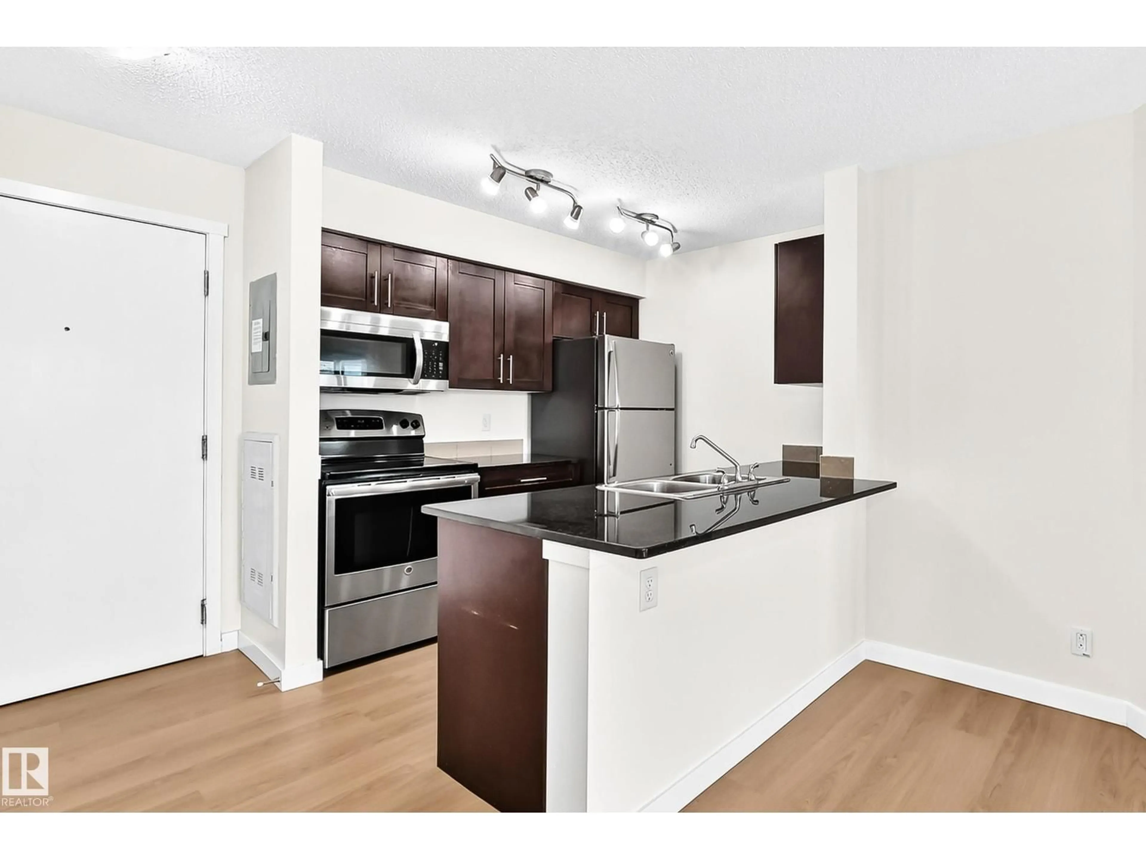Standard kitchen, wood/laminate floor for #206 - 3315 JAMES MOWATT TR, Edmonton Alberta T6W3L6