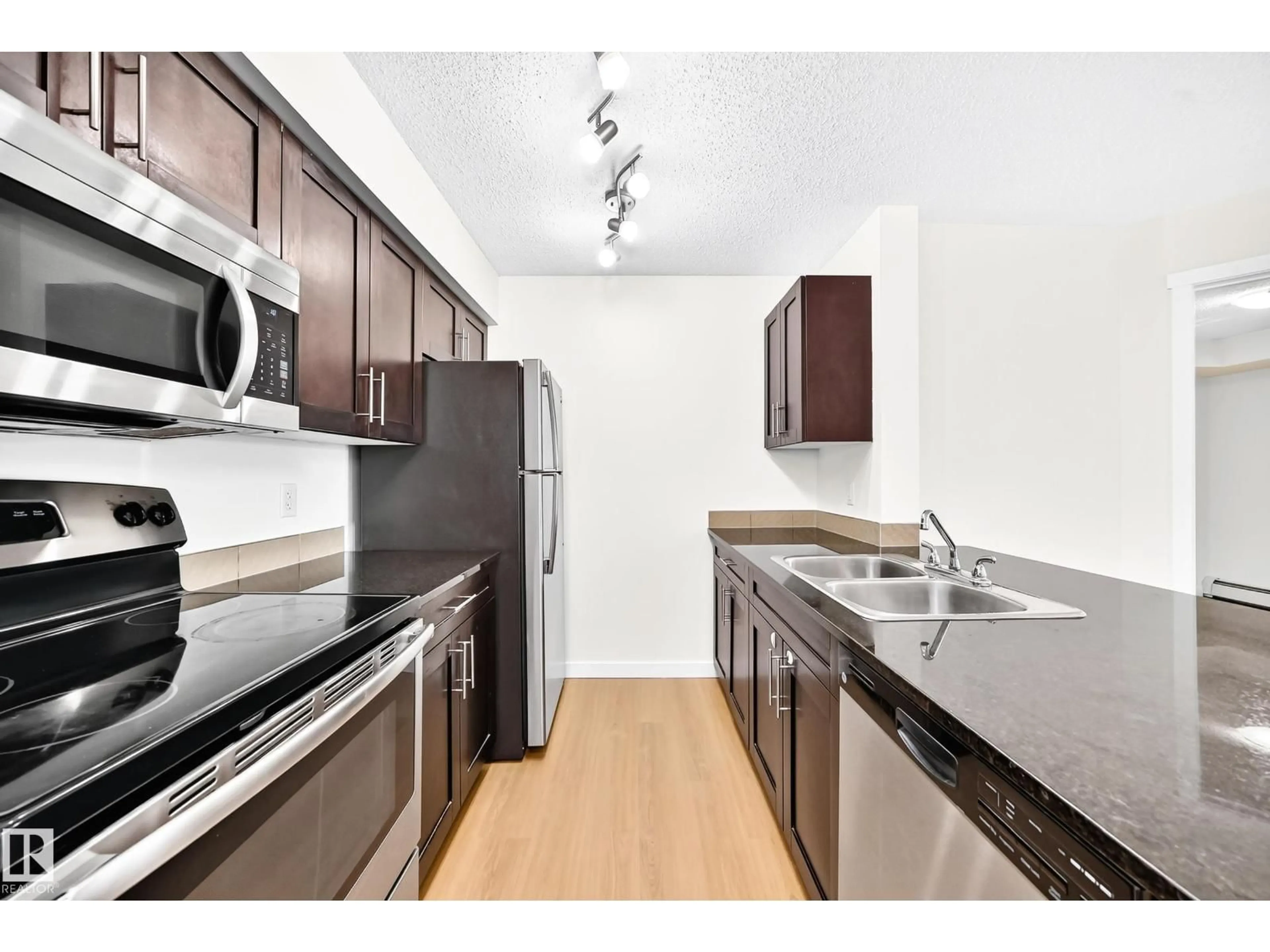 Standard kitchen, unknown for #206 - 3315 JAMES MOWATT TR, Edmonton Alberta T6W3L6