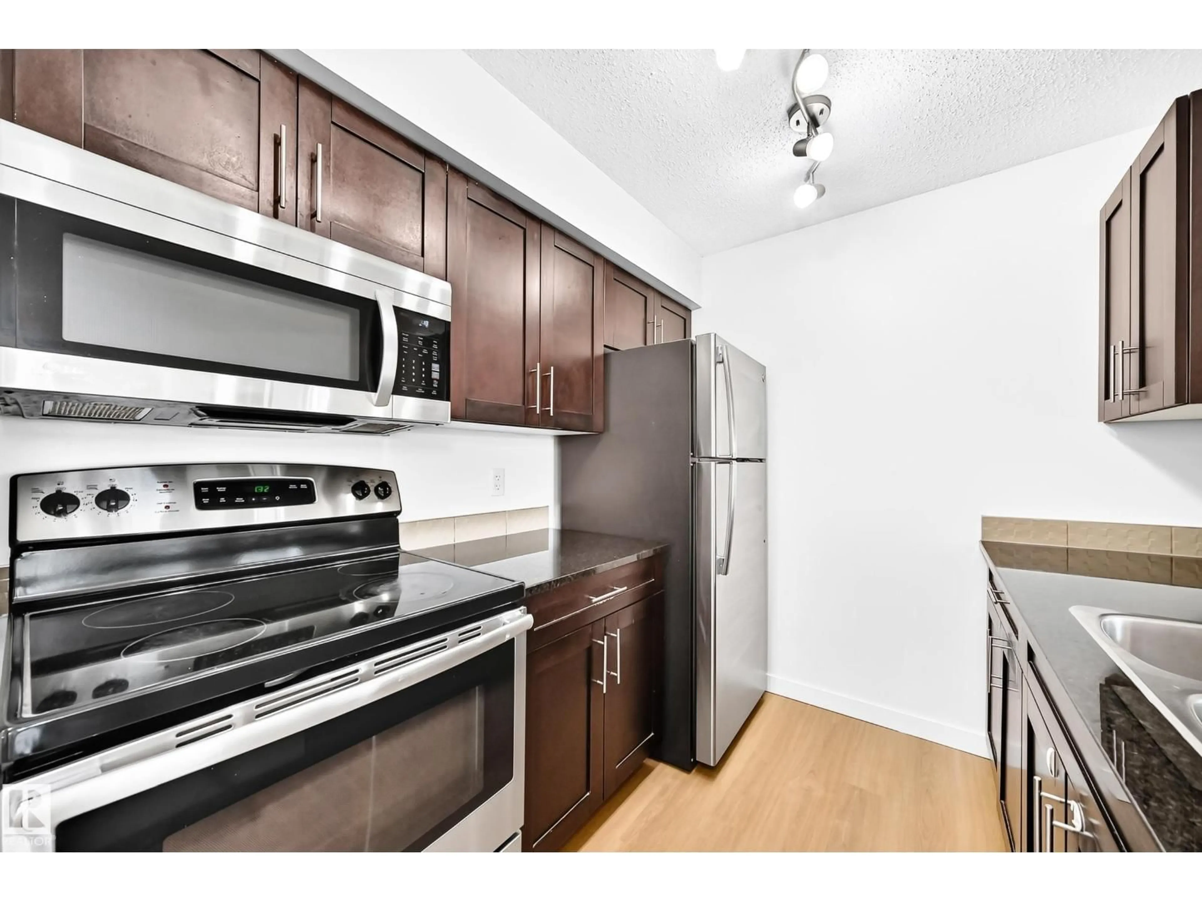 Standard kitchen, unknown for #206 - 3315 JAMES MOWATT TR, Edmonton Alberta T6W3L6