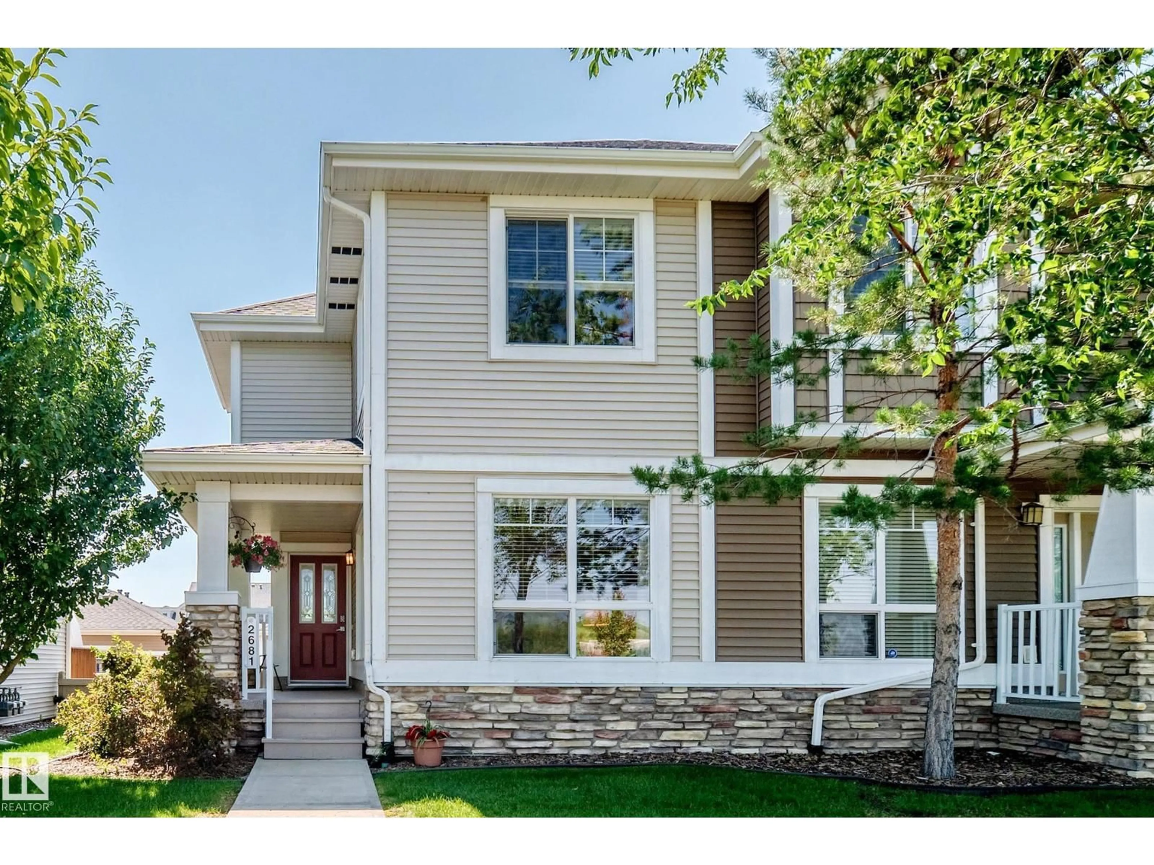 Home with vinyl exterior material, street for 2681 SIR ARTHUR CURRIE WY, Edmonton Alberta T5E6S8